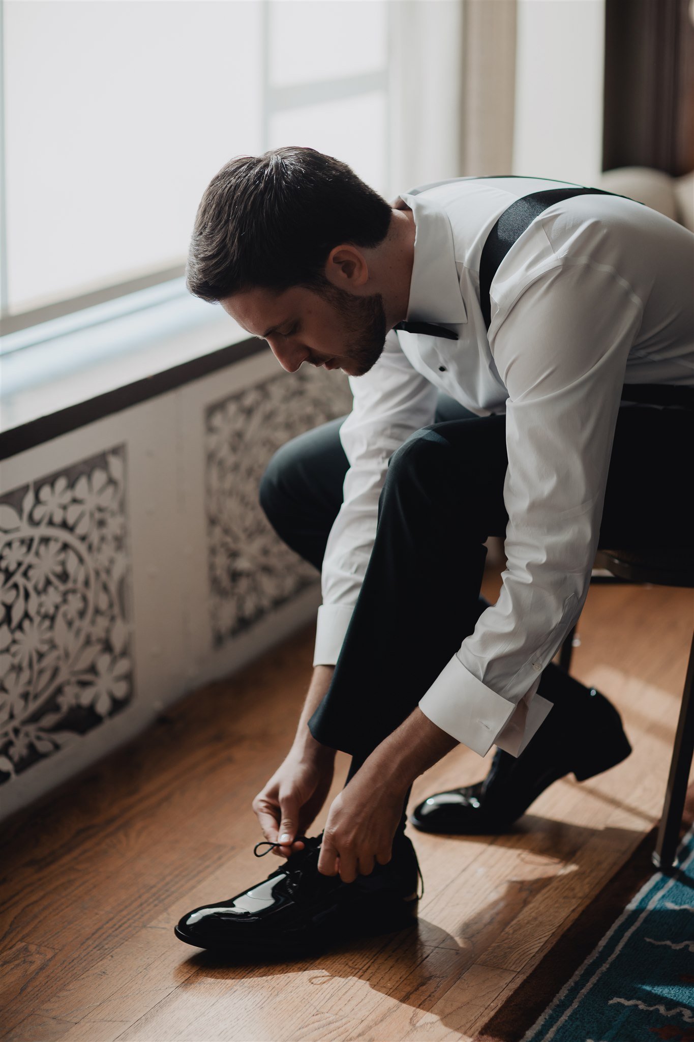 Groom Getting Ready at Bel Air Bay Club taken by Lulan Studio