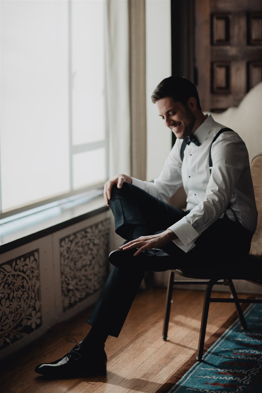 Groom Getting Ready at Bel Air Bay Club taken by Lulan Studio