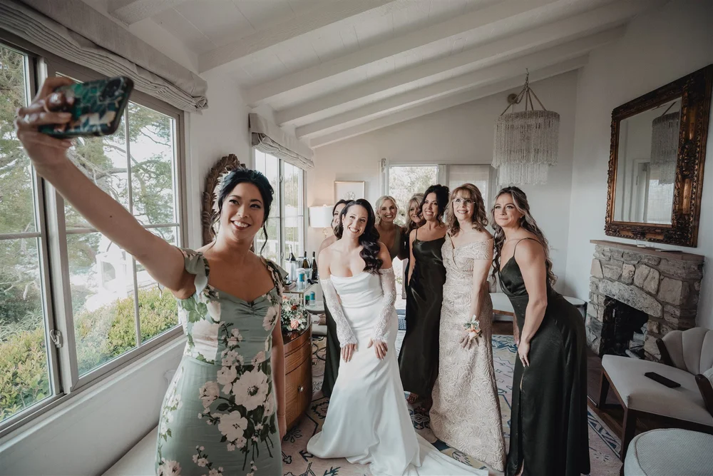 Bride and bridesmaids in the bright getting-ready room at La Venta Inn