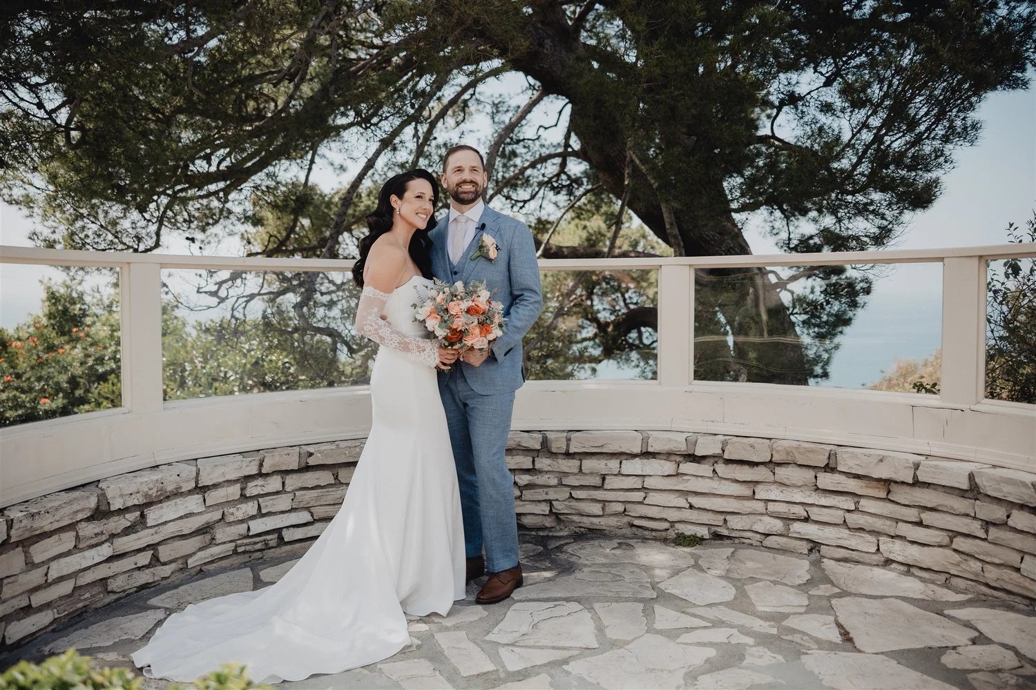 Couple on the curved stone terrace at La Venta Inn