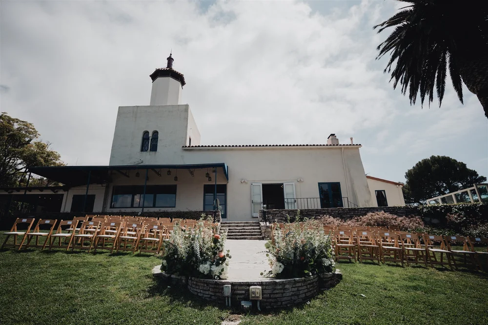 The 1923 tower and ocean-view lawn at La Venta Inn in Palos Verdes Estates on a cloudy afternoon