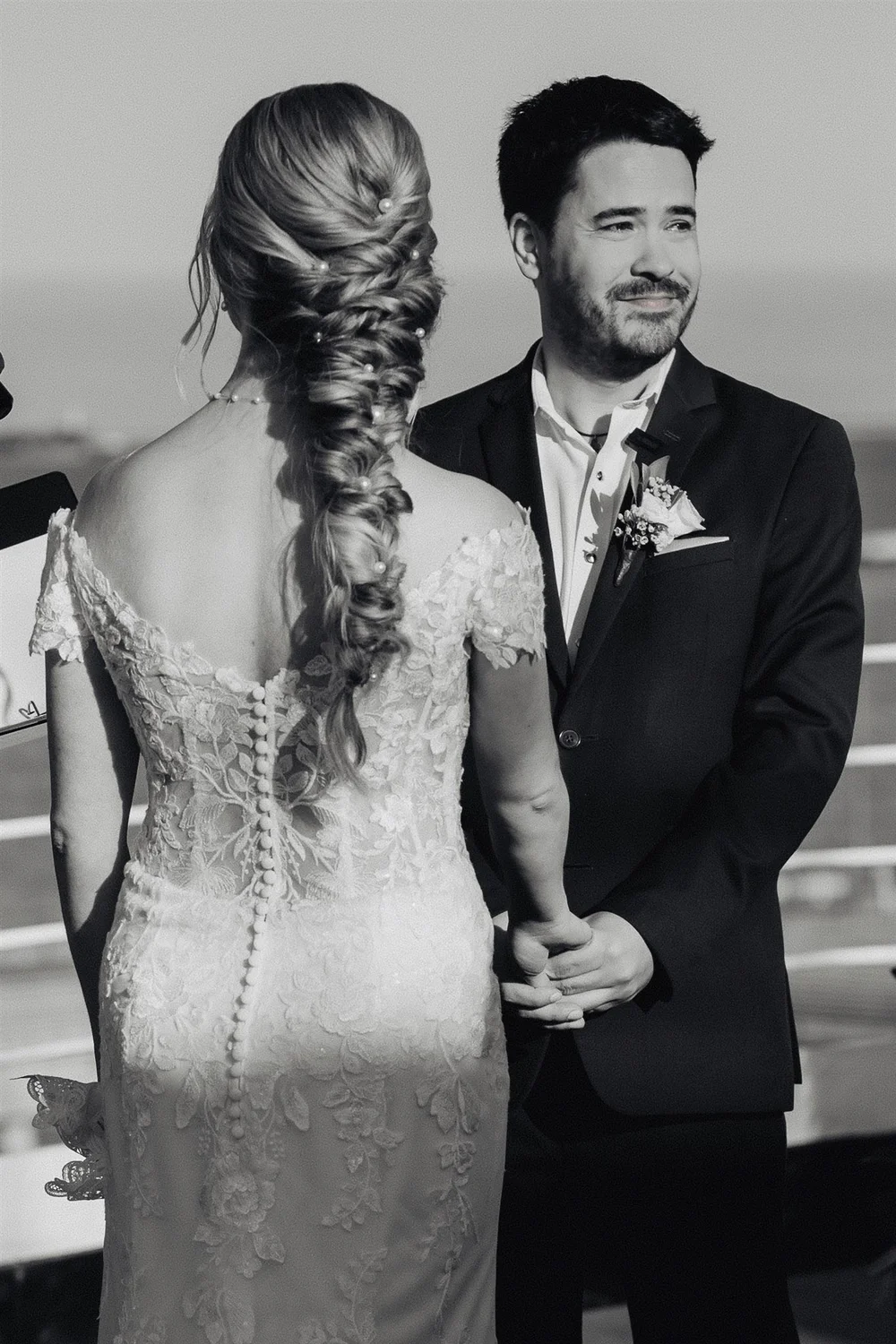 Bride and groom on the deck of the Queen Mary ocean liner in Long Beach