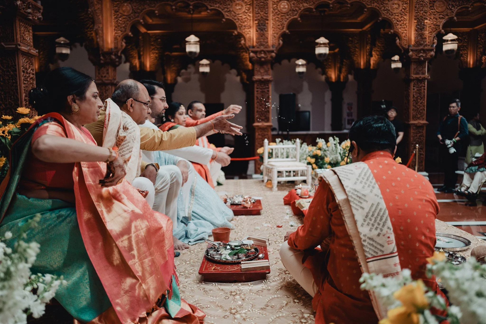 bride &amp; groom celebrating at their indian wedding