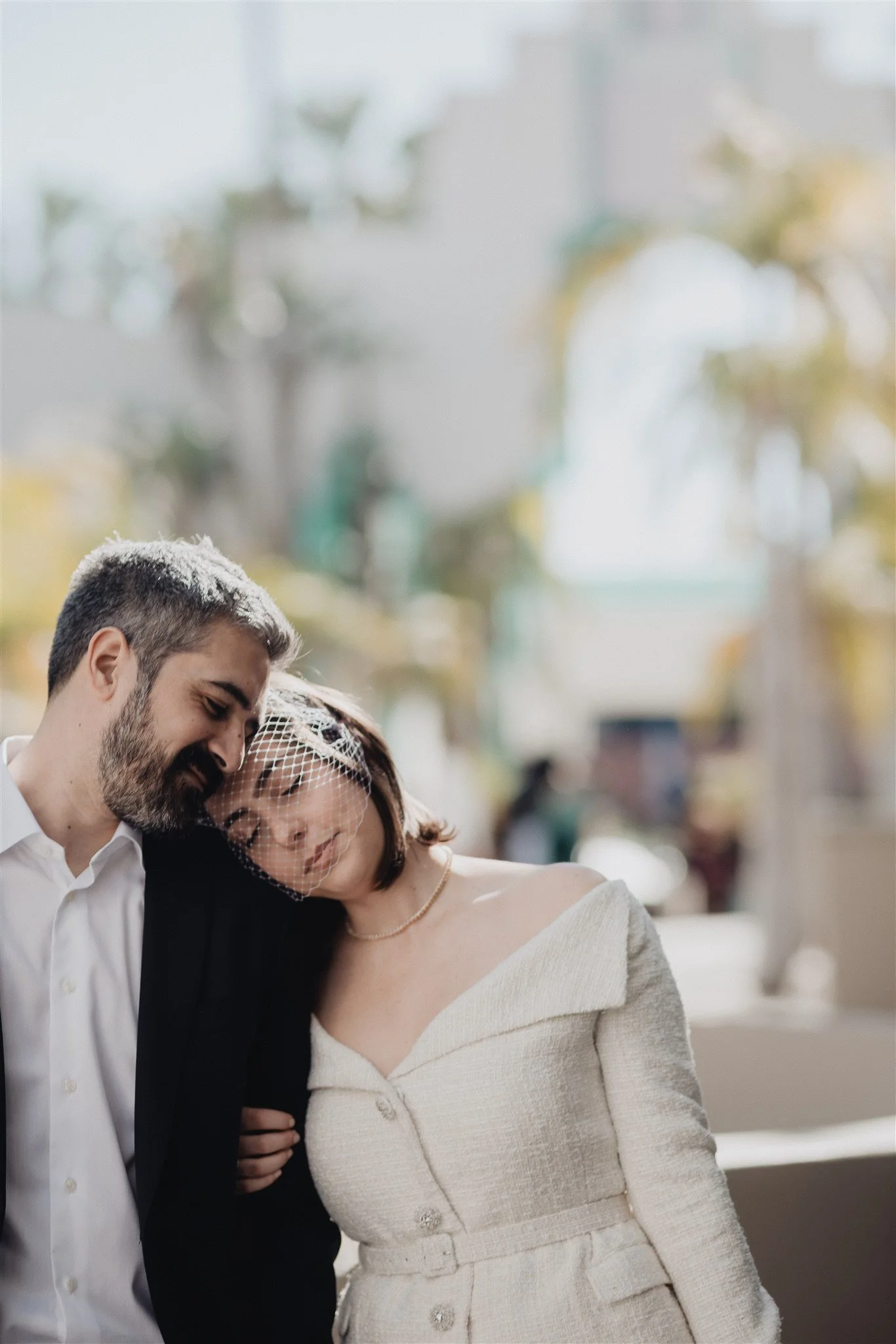 Close portrait of a bride in a pearl headpiece after her Los Angeles courthouse wedding