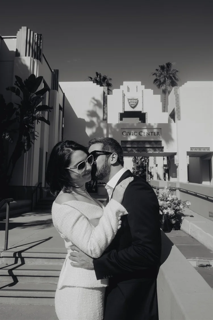 Black and white portrait of a couple embracing after their intimate Los Angeles wedding