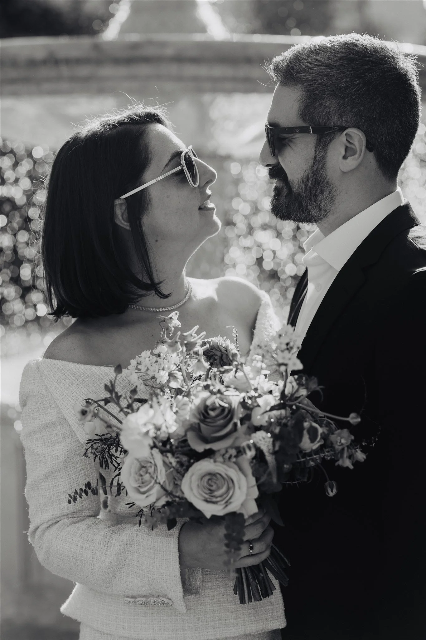 Bride holding her bouquet in a portrait after a small Beverly Hills courthouse wedding