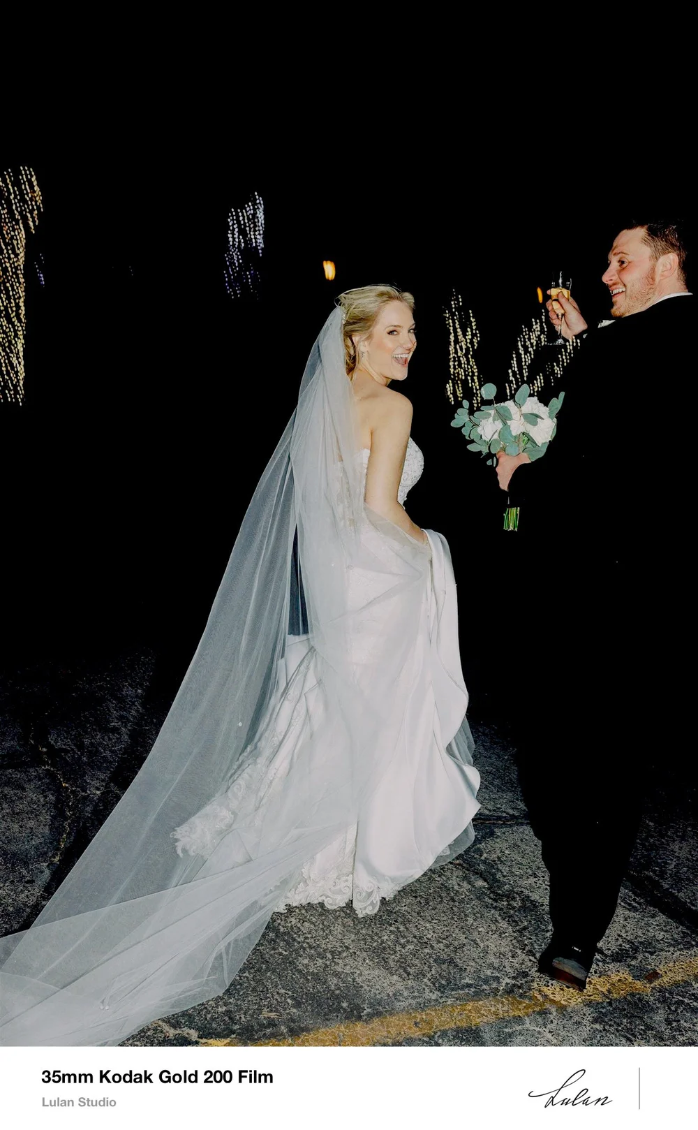 35mm Kodak Gold 200 film — bride's veil trailing behind her in evening light
