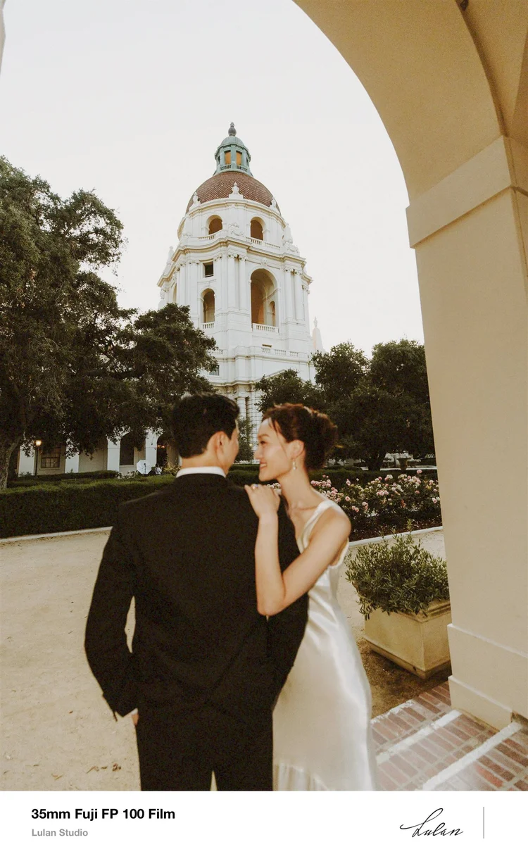 35mm Fuji FP-100 film — couple embracing beneath an arch at Pasadena City Hall