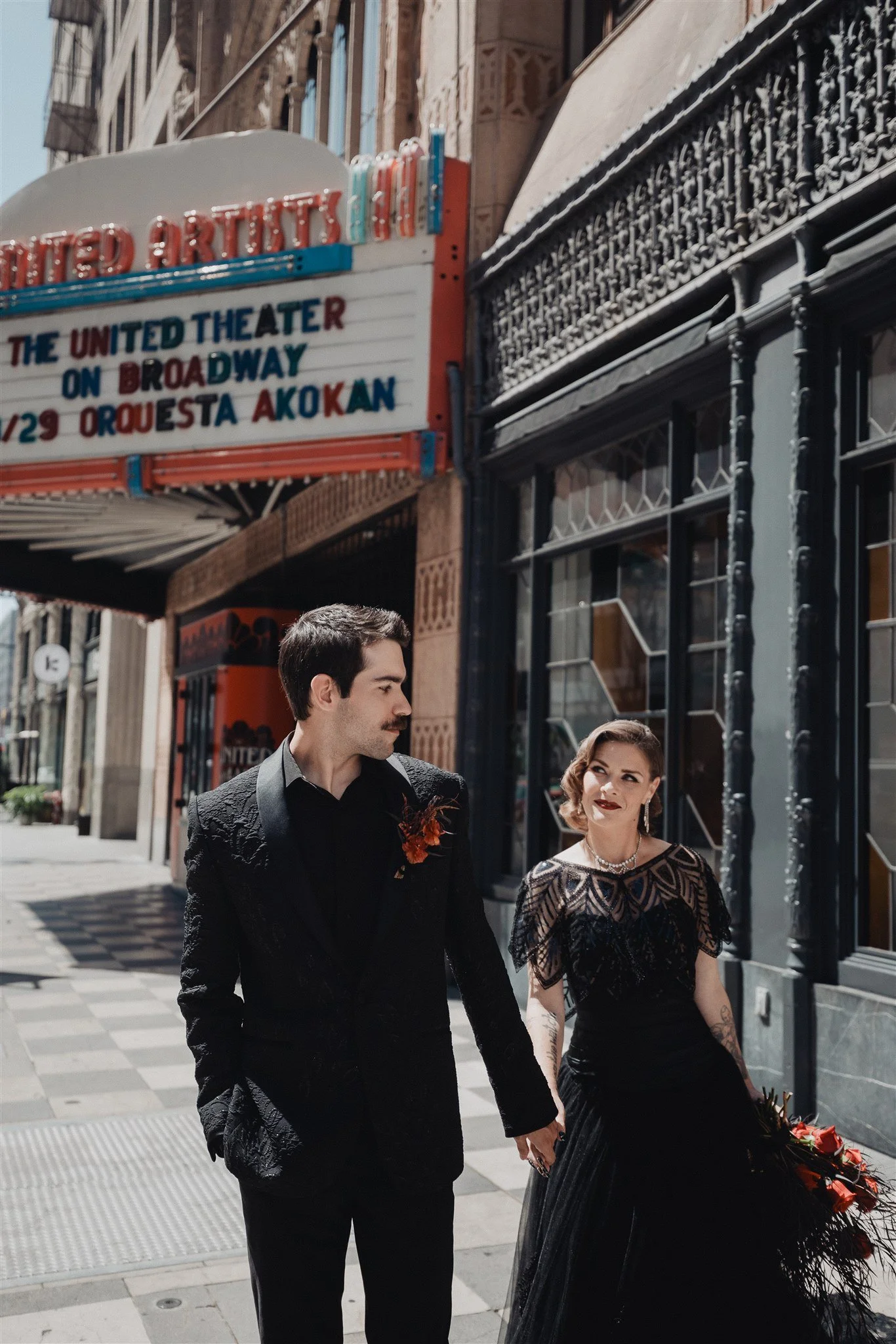 bride &amp; groom sweetheart photos on their wedding at united theater