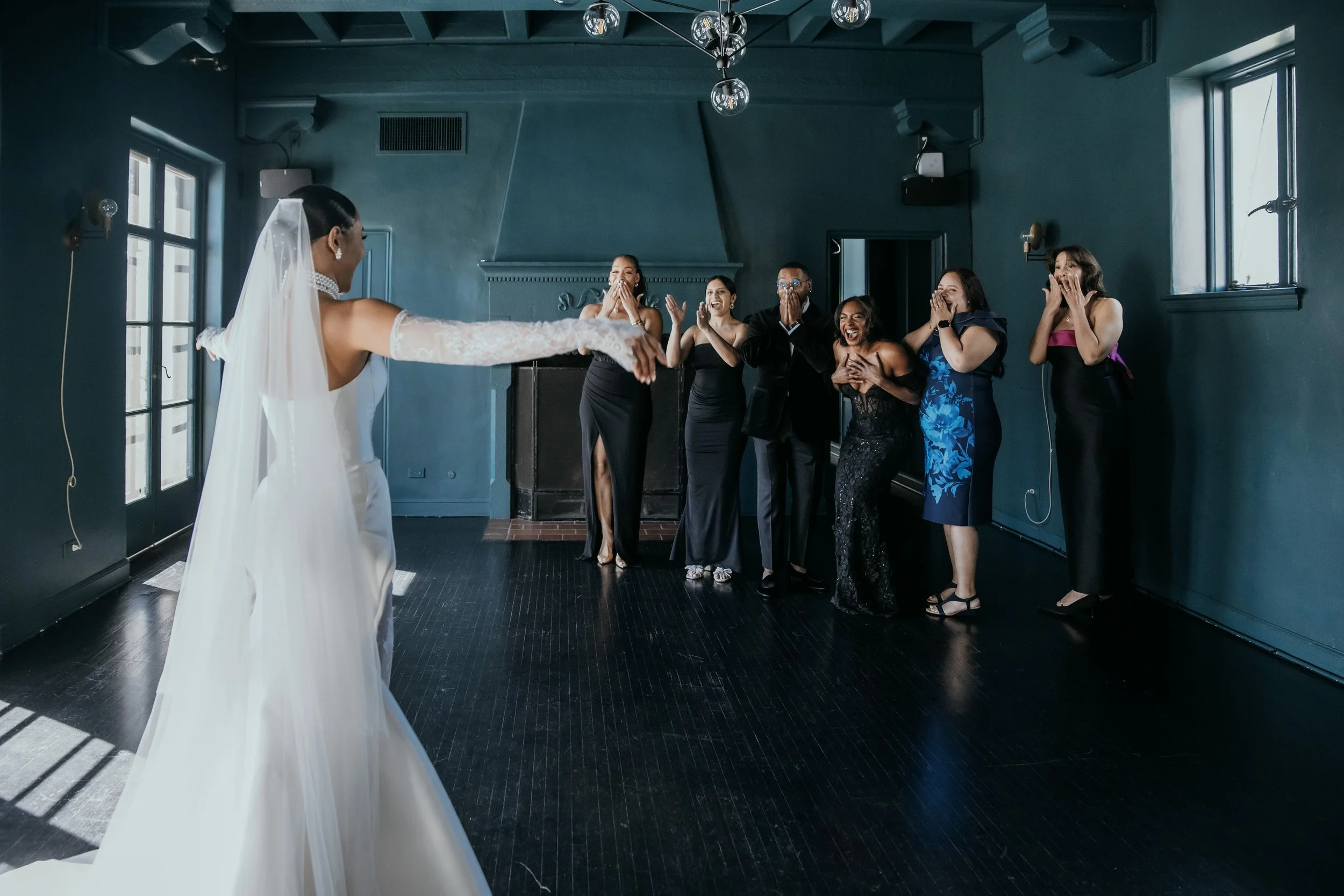 bride first look with her bridesmaids