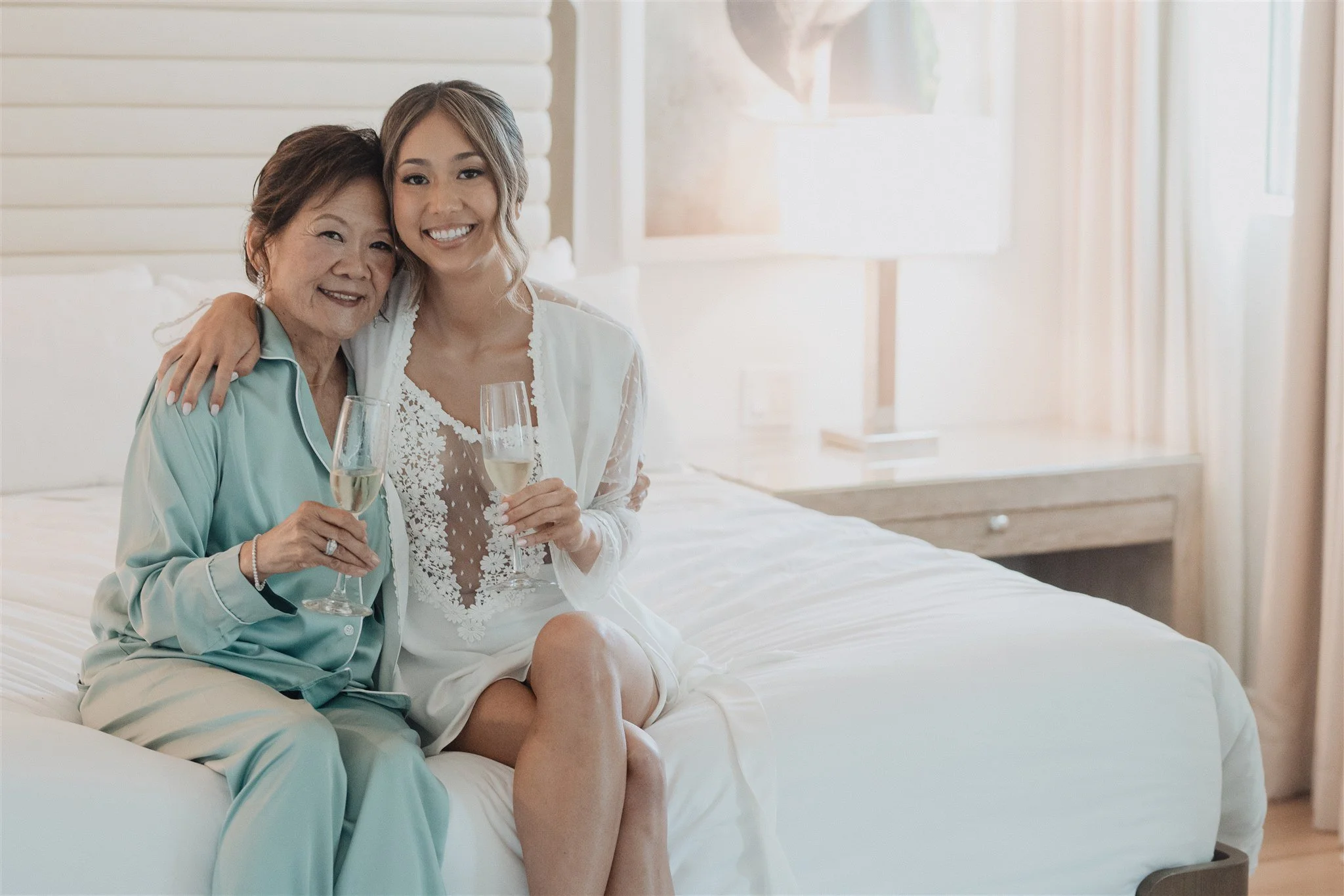 bride and her bridesmaids getting ready robes on her wedding day at skirball cultural center