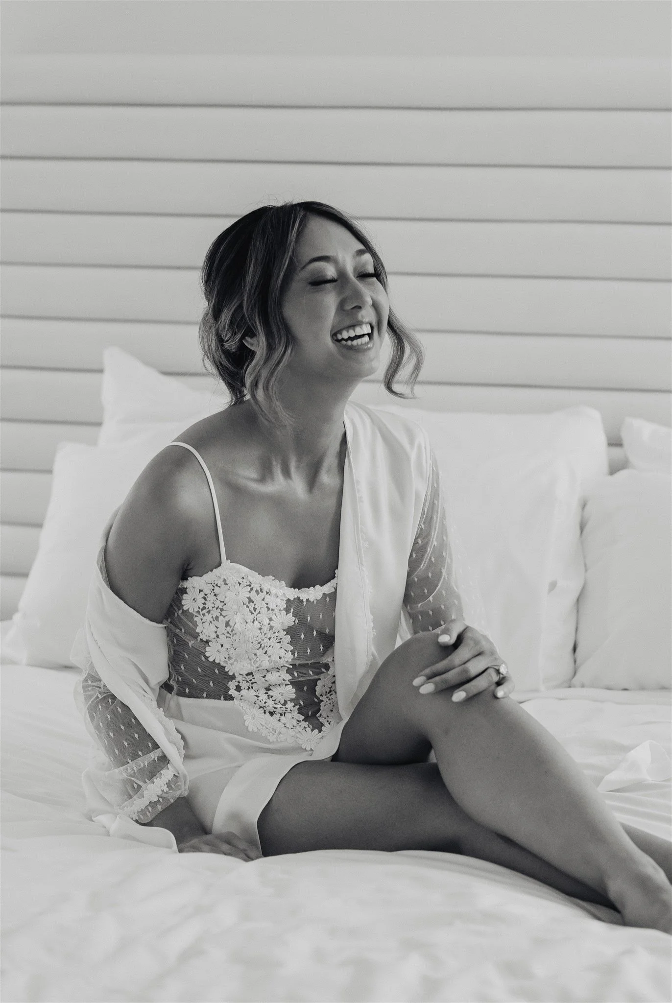 bride getting ready robes on her wedding day at skirball cultural center