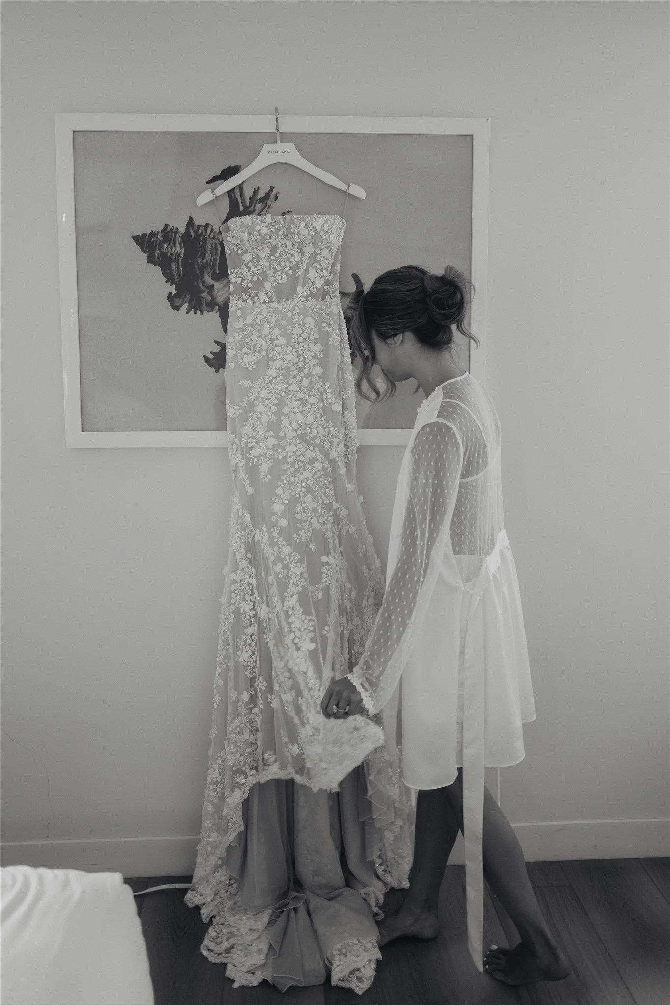 bride getting ready robes on her wedding day at skirball cultural center