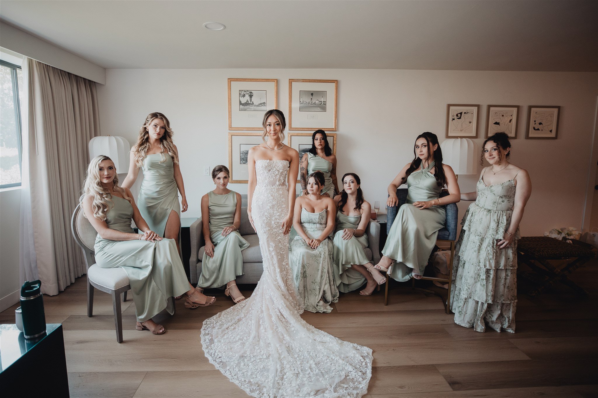 bride with her bridesmaids on her wedding day