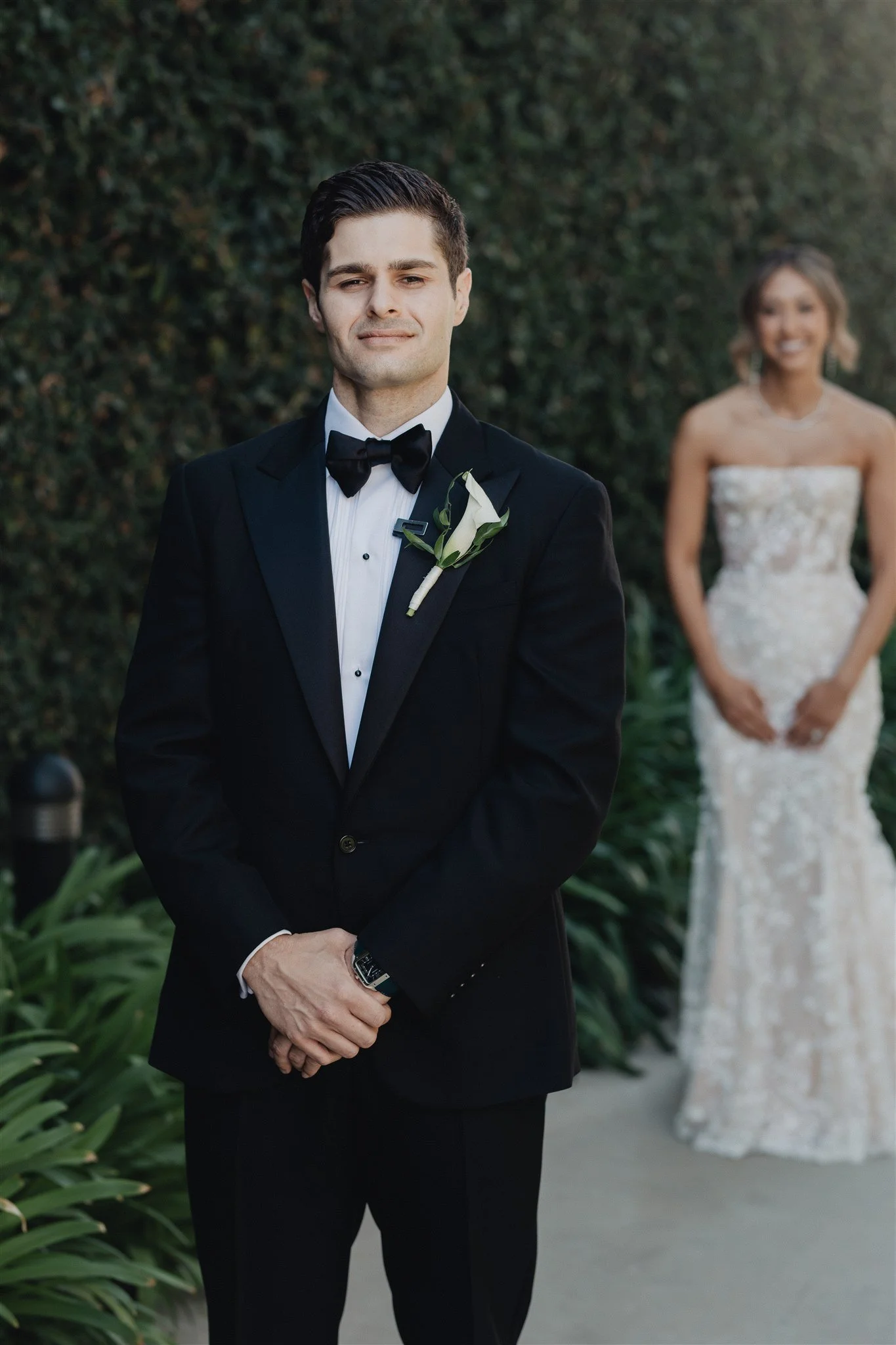 bride and groom first look on their wedding day at skirball cultural center