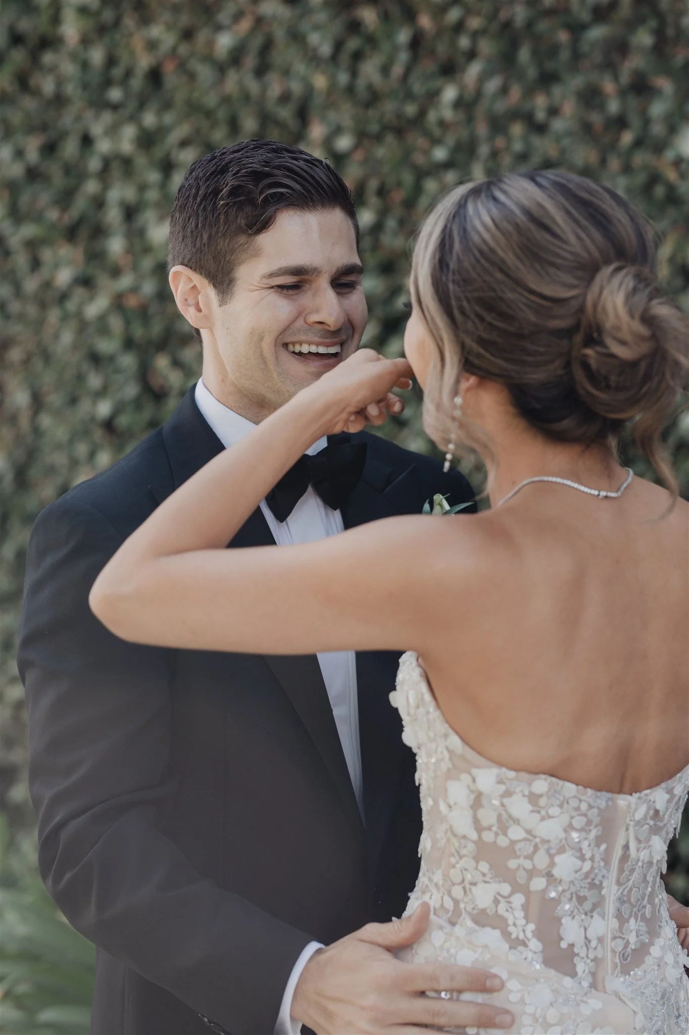 bride and groom first look on their wedding day at skirball cultural center