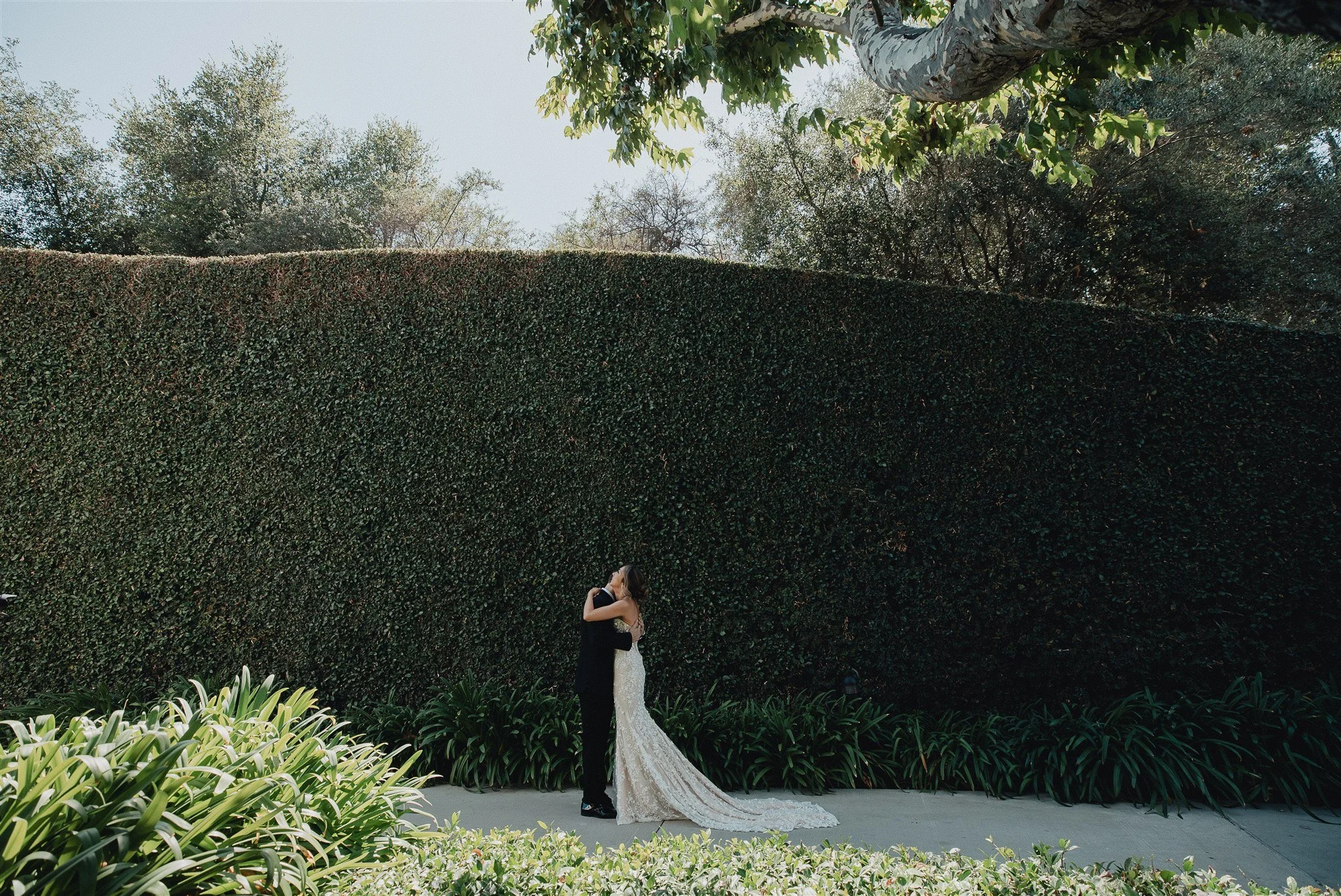 bride and groom first look on their wedding day at skirball cultural center