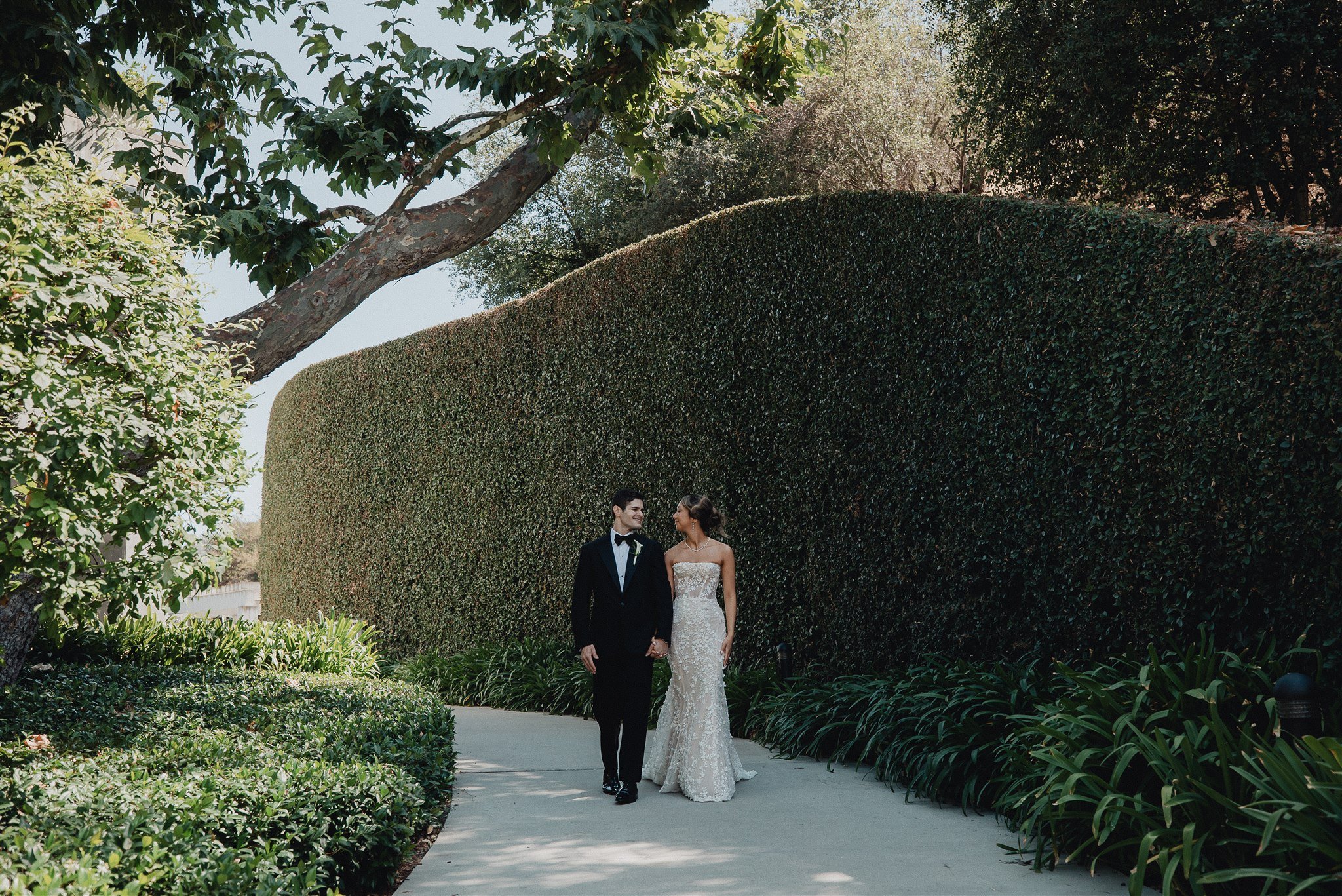 bride and groom first look on their wedding day at skirball cultural center