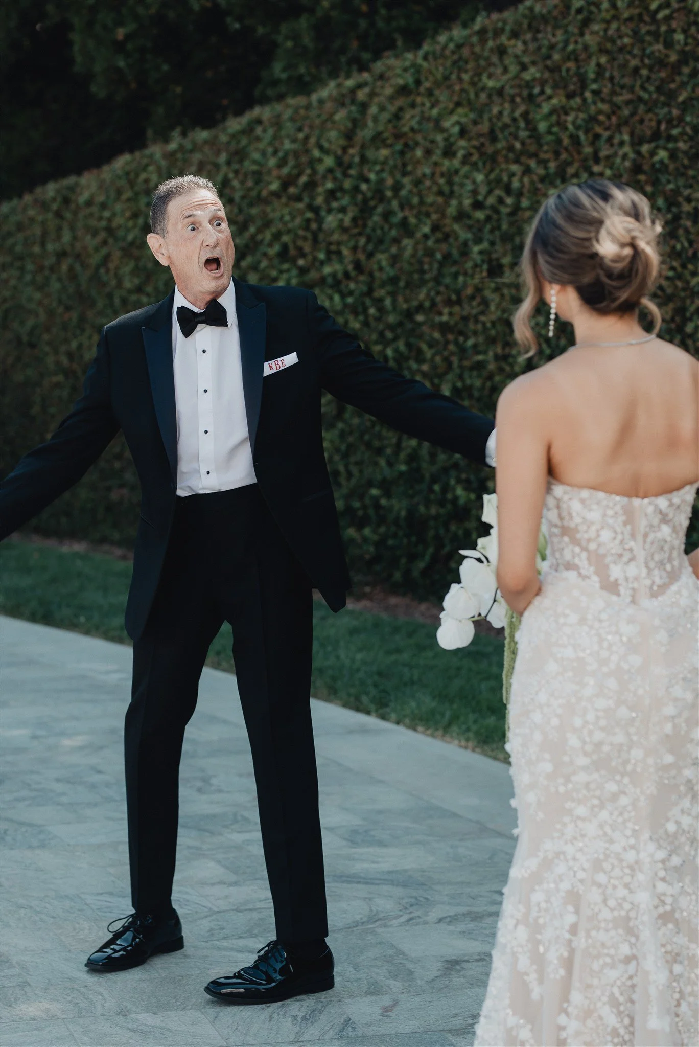 bride and groom first look on their wedding day at skirball cultural center