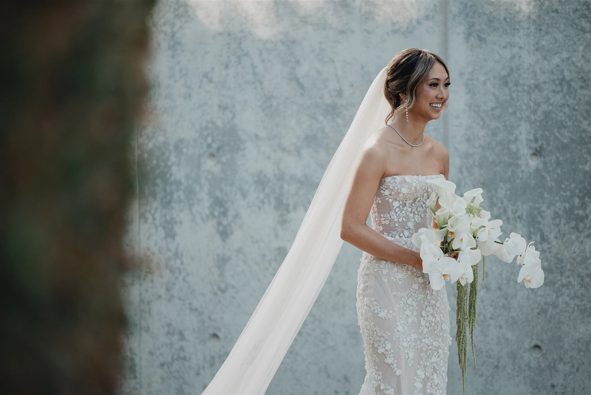 bride walking down the aisle for her wedding ceremony at skirball cultural center