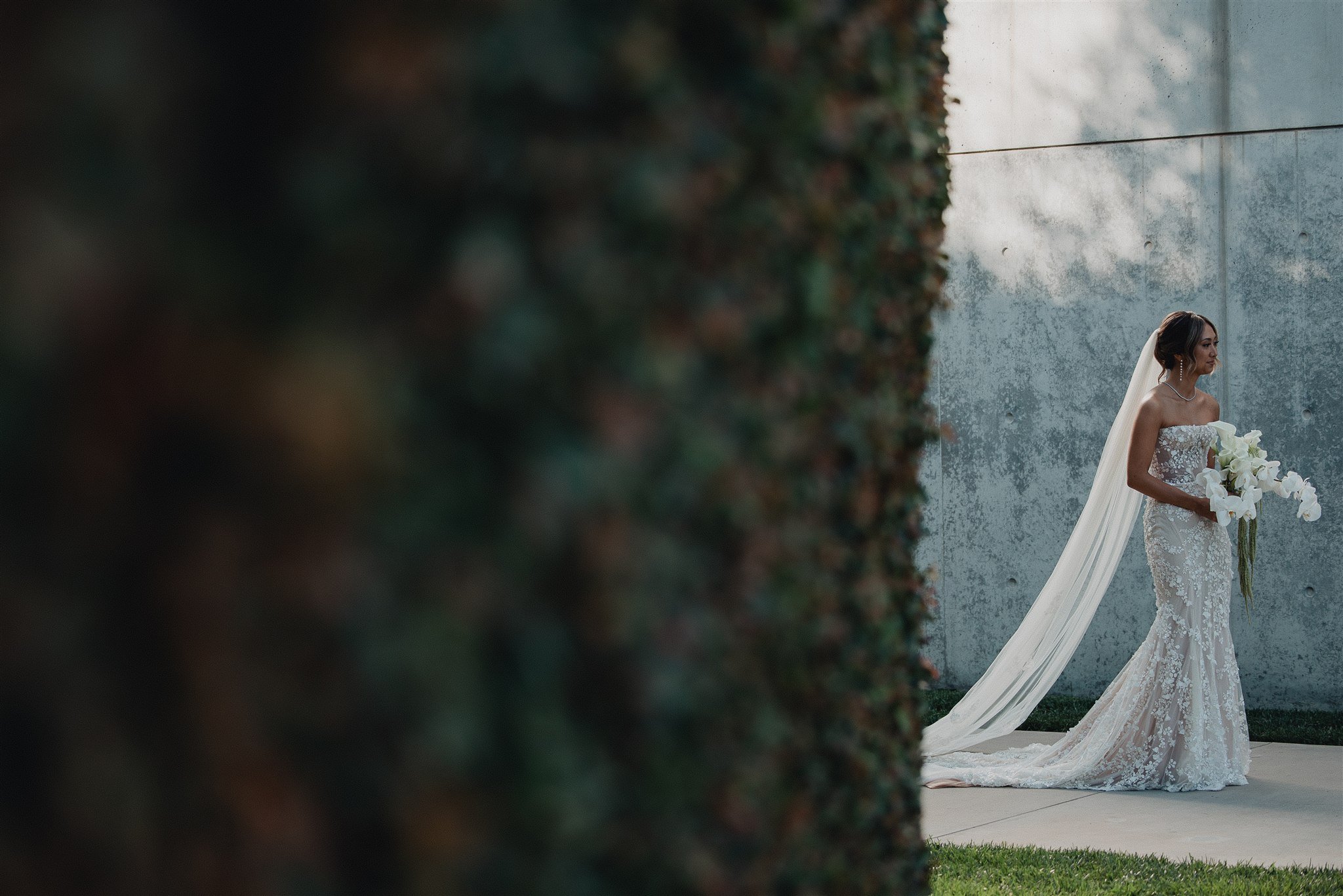 bride walking down the aisle for her wedding ceremony at skirball cultural center