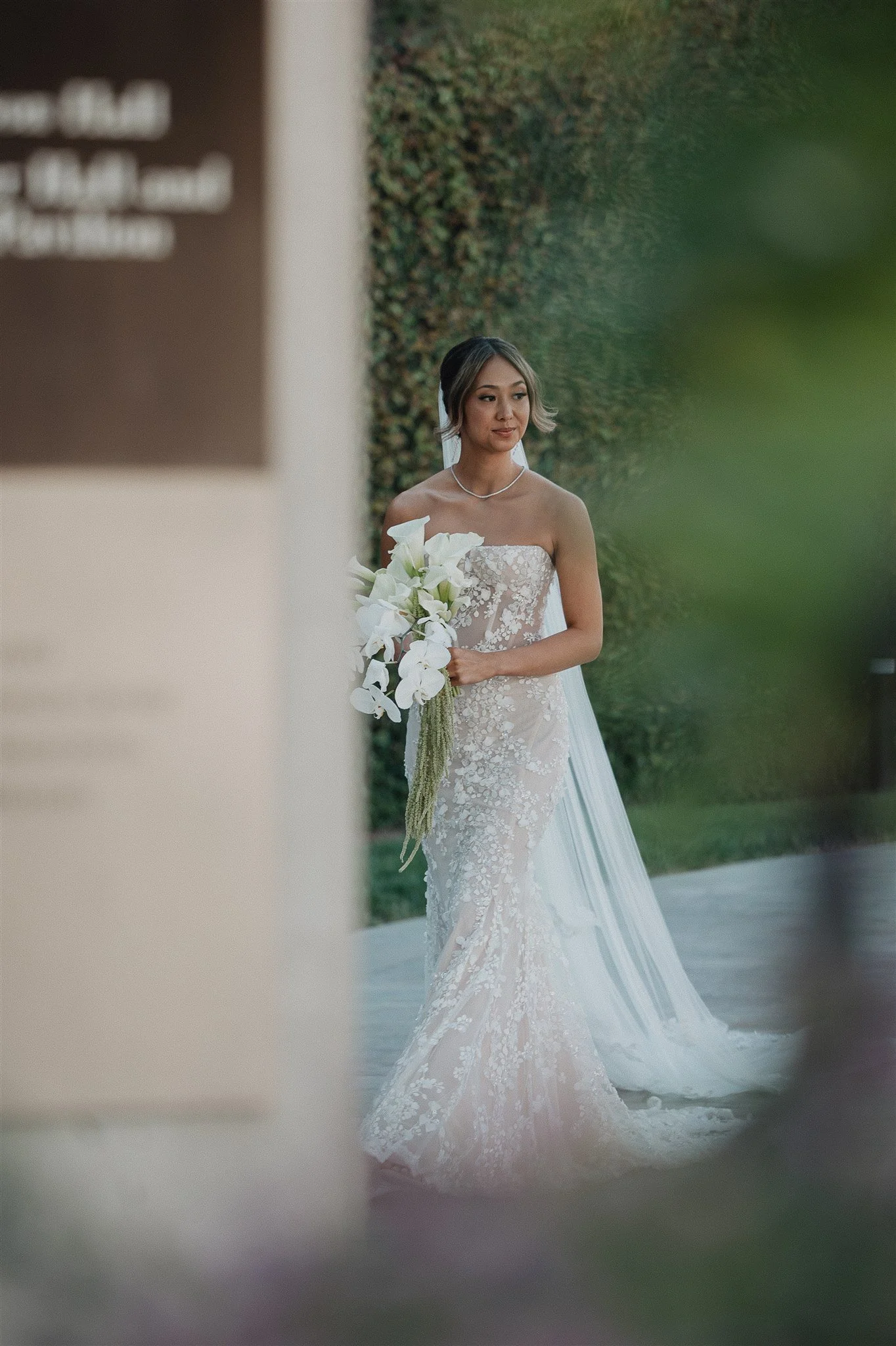bride walking down the aisle for her wedding ceremony at skirball cultural center