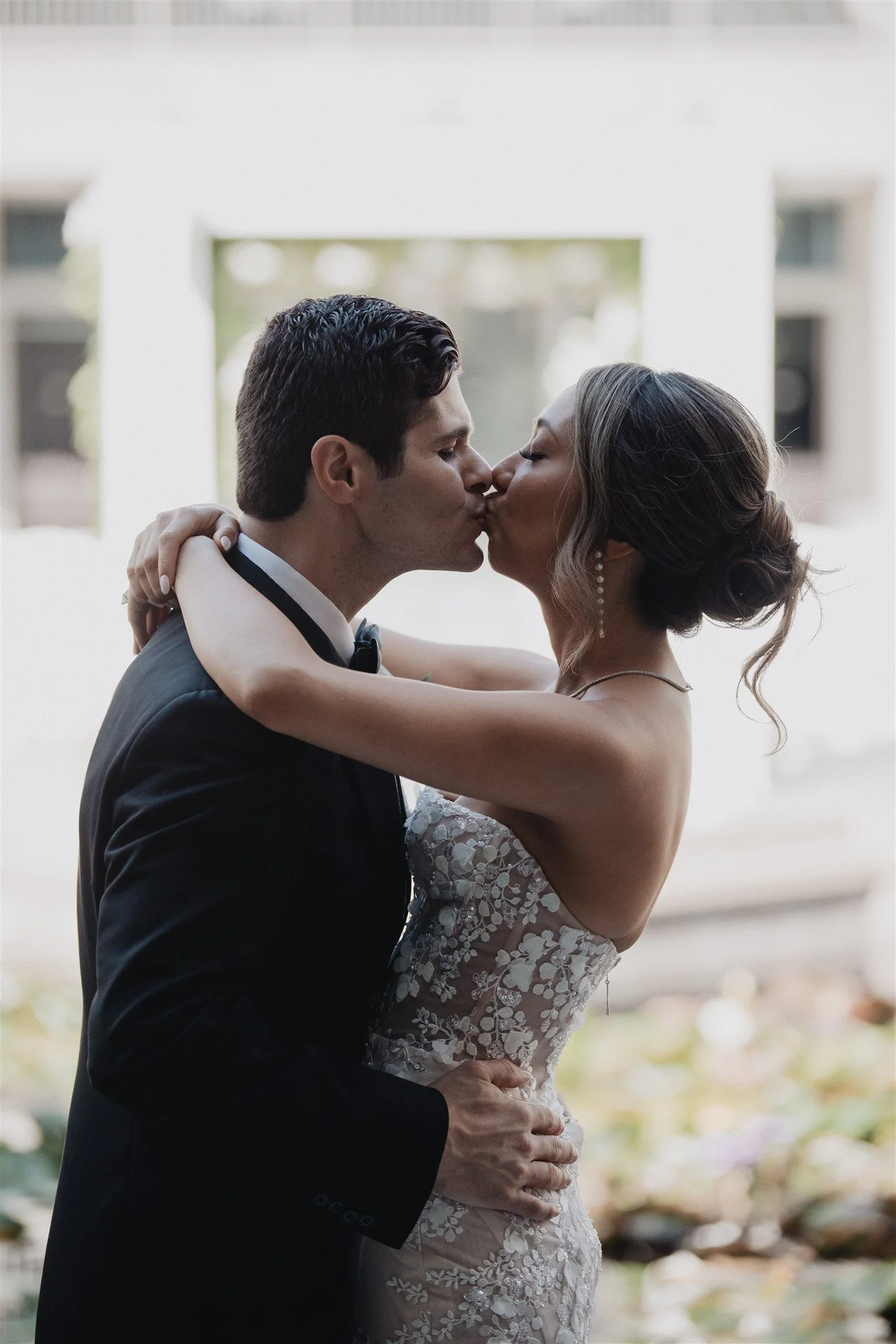 bride and groom sweetheart photos on their wedding day at skirball cultural center
