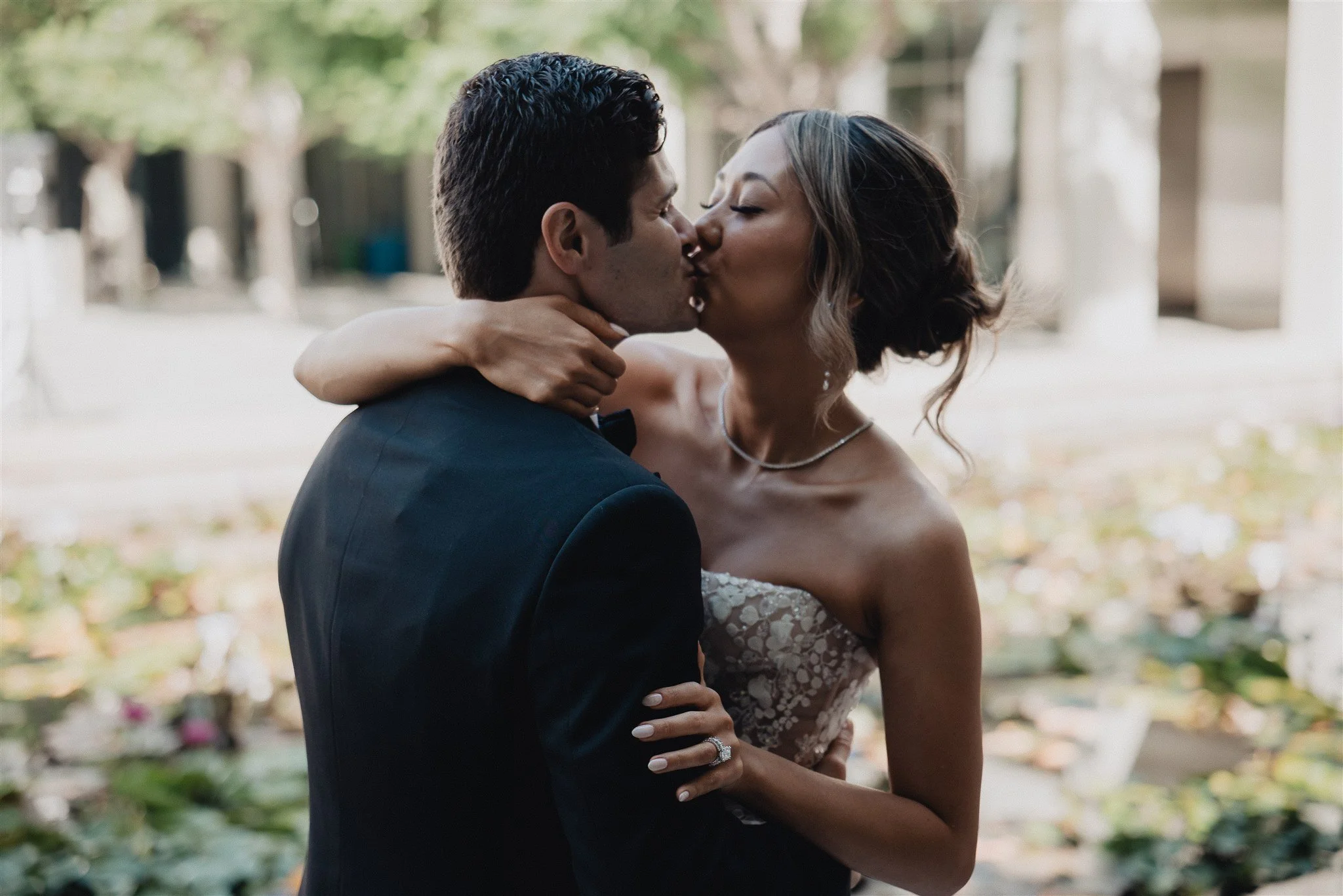 bride and groom sweetheart photos on their wedding day at skirball cultural center