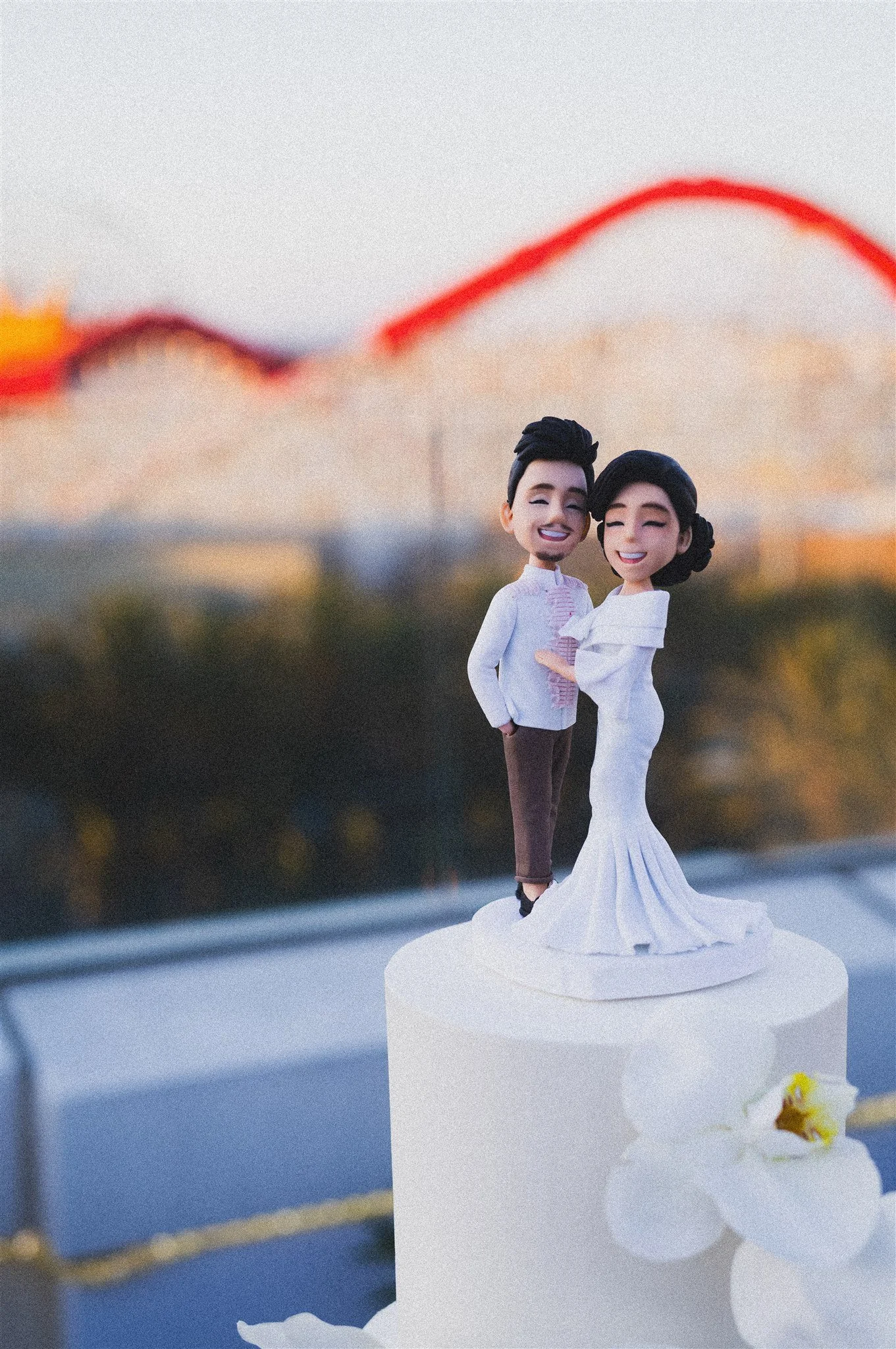 bride and groom at their wedding reception at california adventure disney park