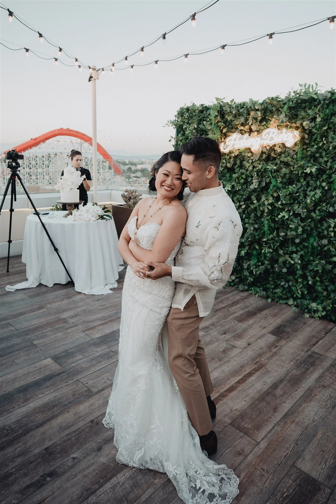 bride and groom first dance at their wedding reception at california adventure disney park