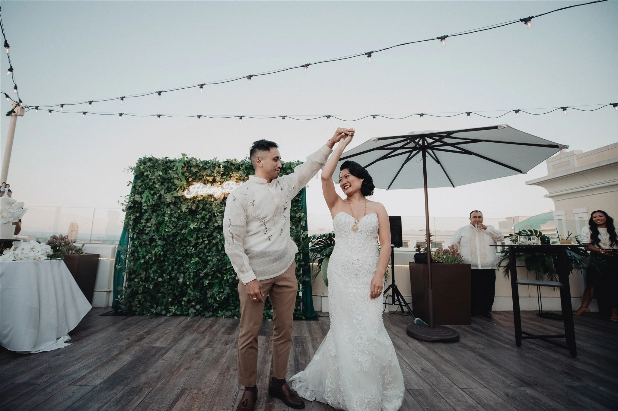 bride and groom first dance at their wedding reception at california adventure disney park
