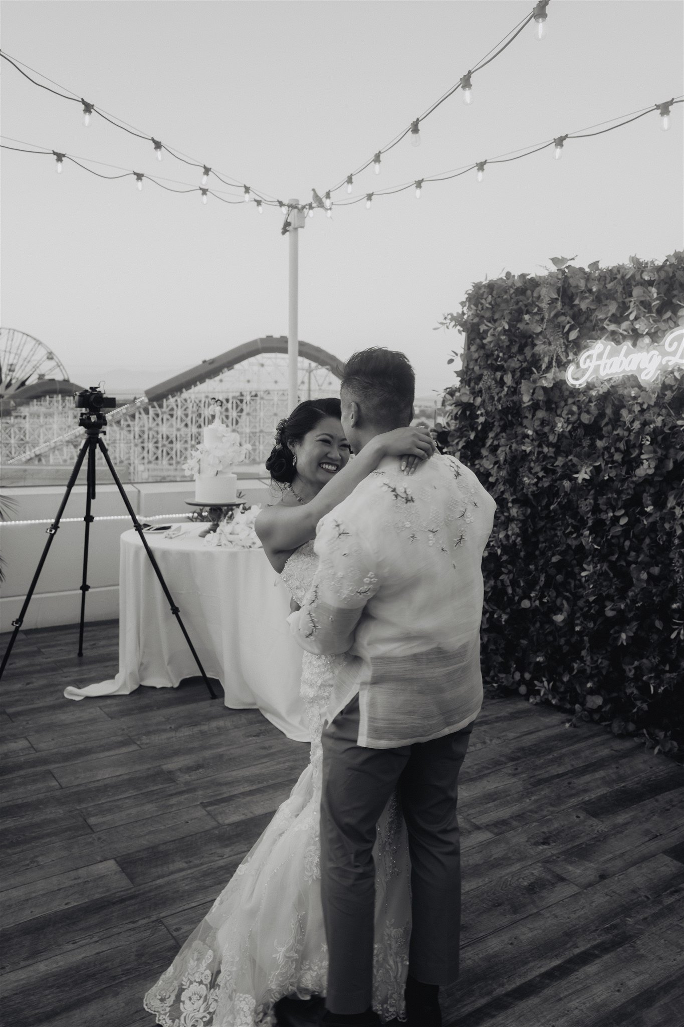 bride and groom first dance at their wedding reception at california adventure disney park