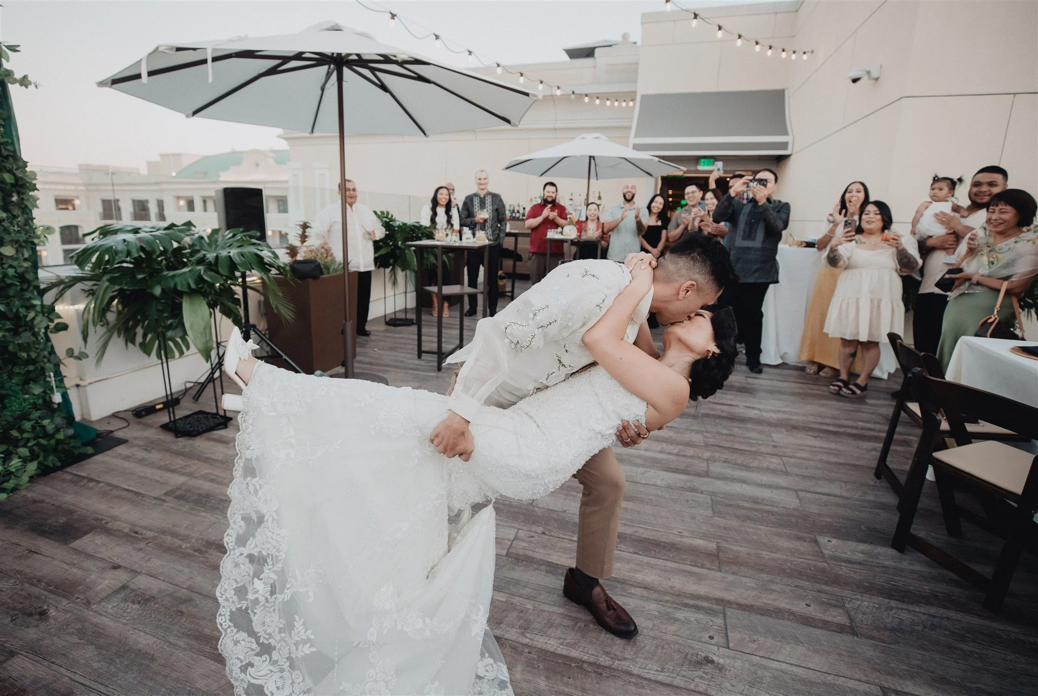bride and groom first dance at their wedding reception at california adventure disney park