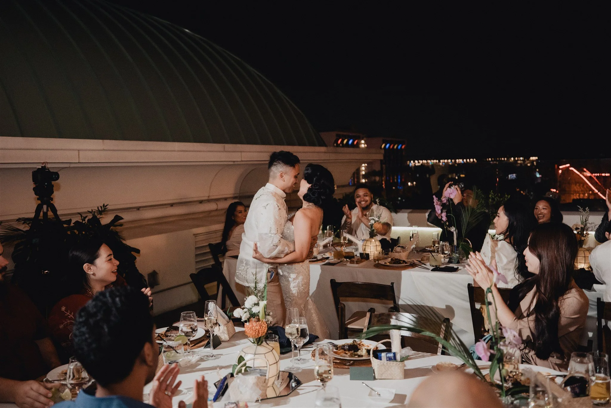 bride and groom at their wedding reception at california adventure disney park