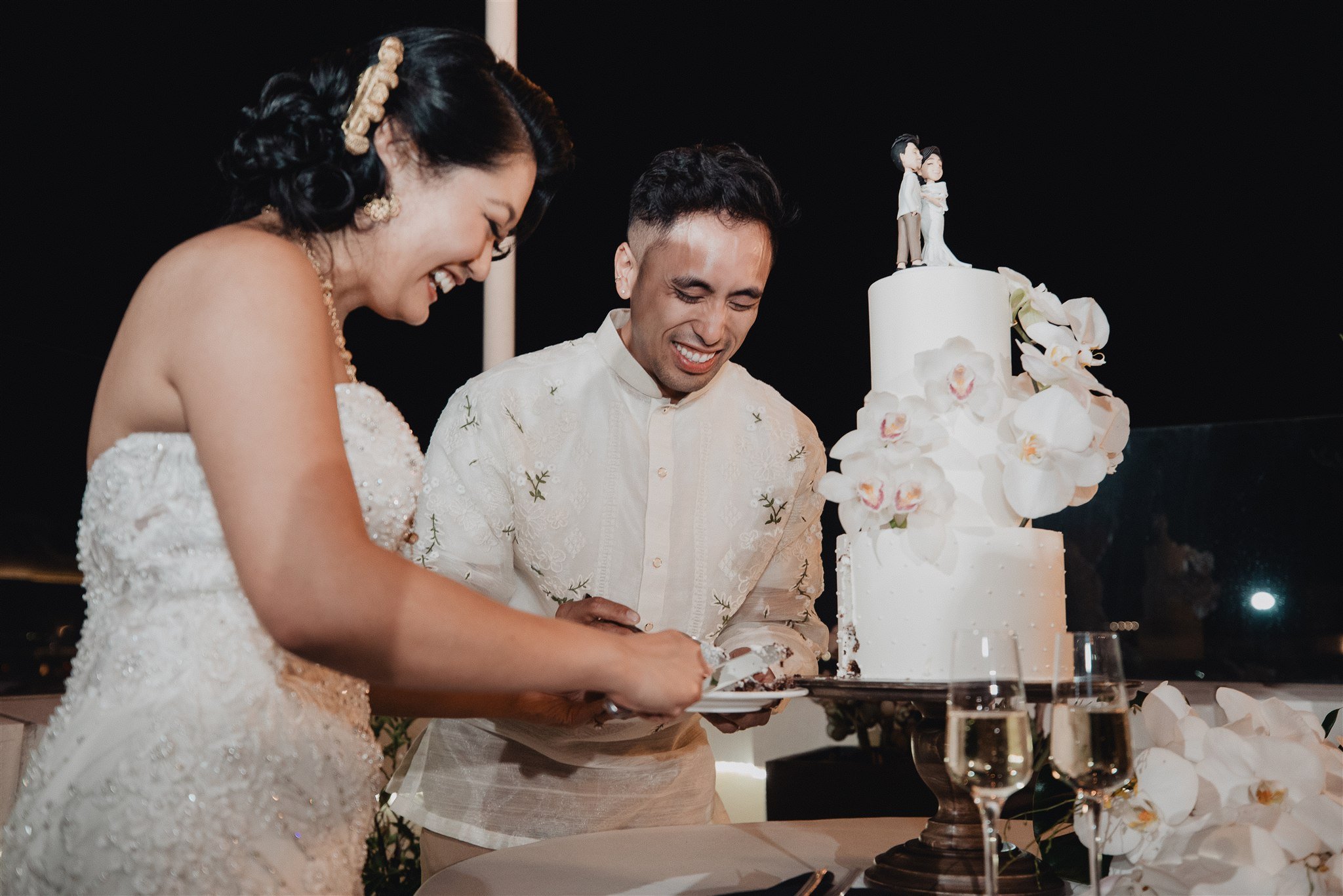 bride and groom at their wedding reception at california adventure disney park