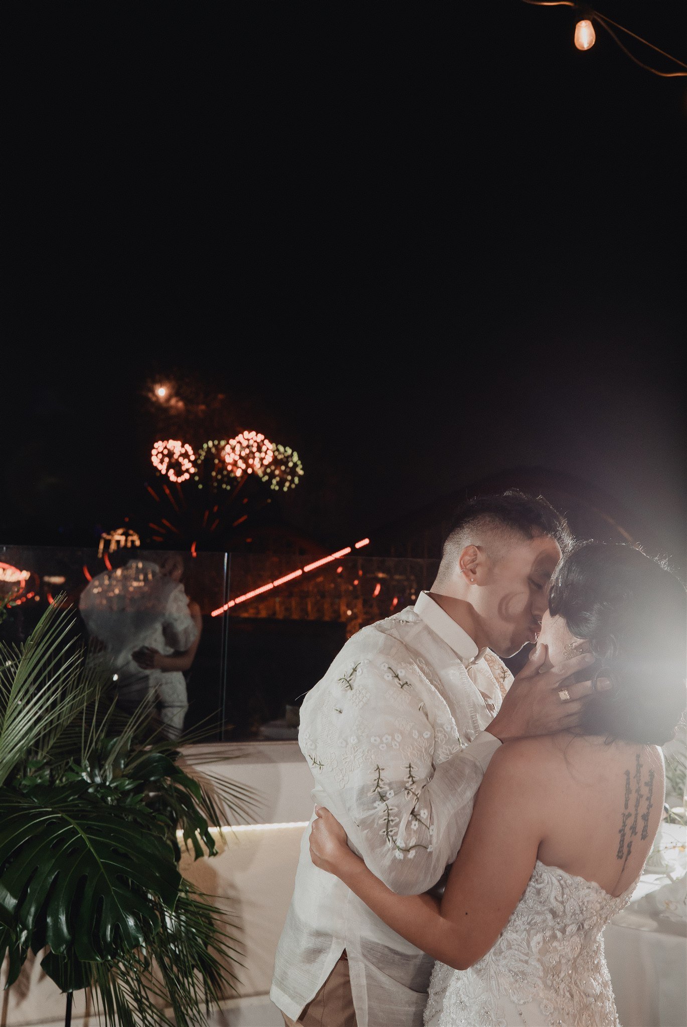 bride and groom at their wedding reception at california adventure disney park