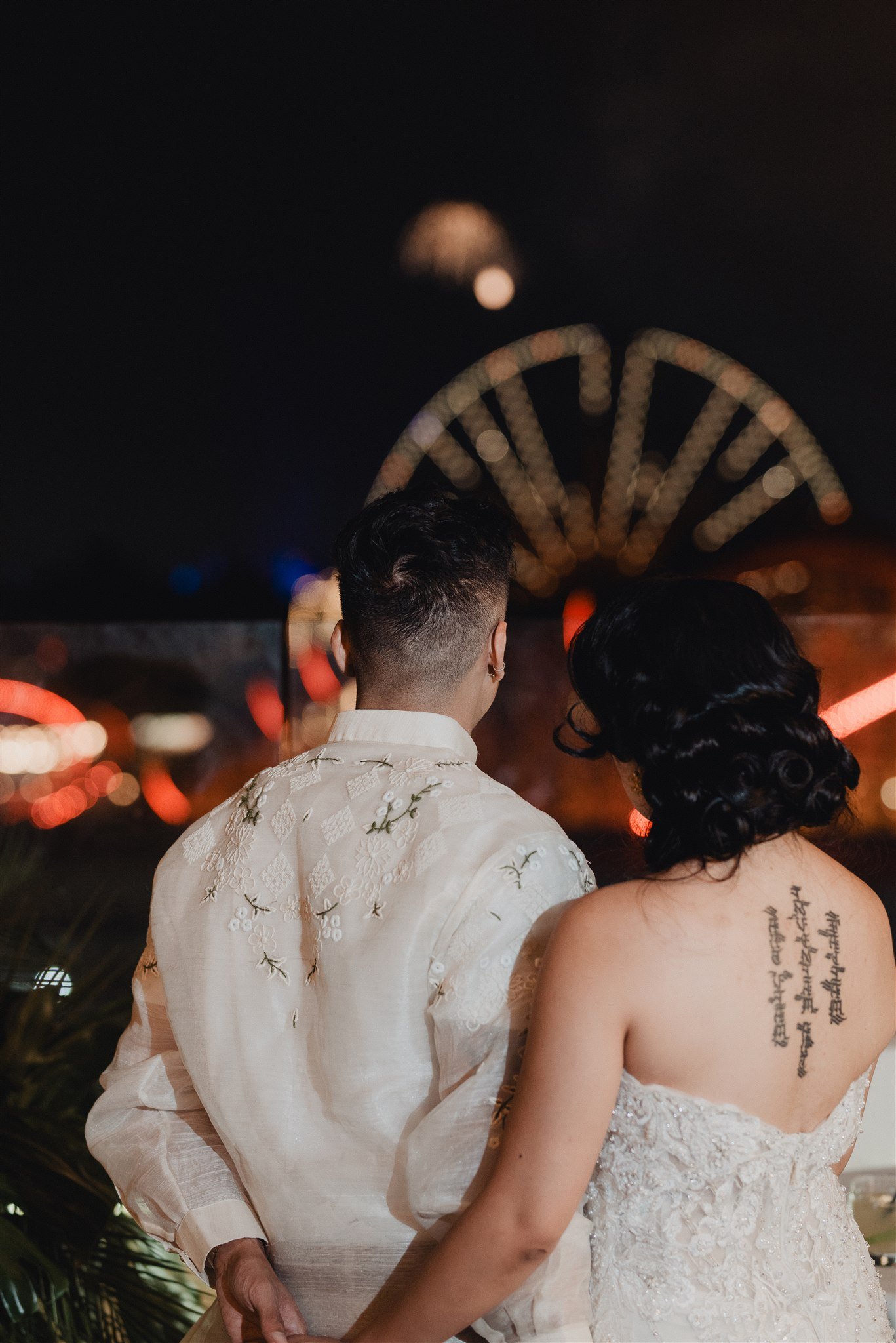 bride and groom at their wedding reception at california adventure disney park