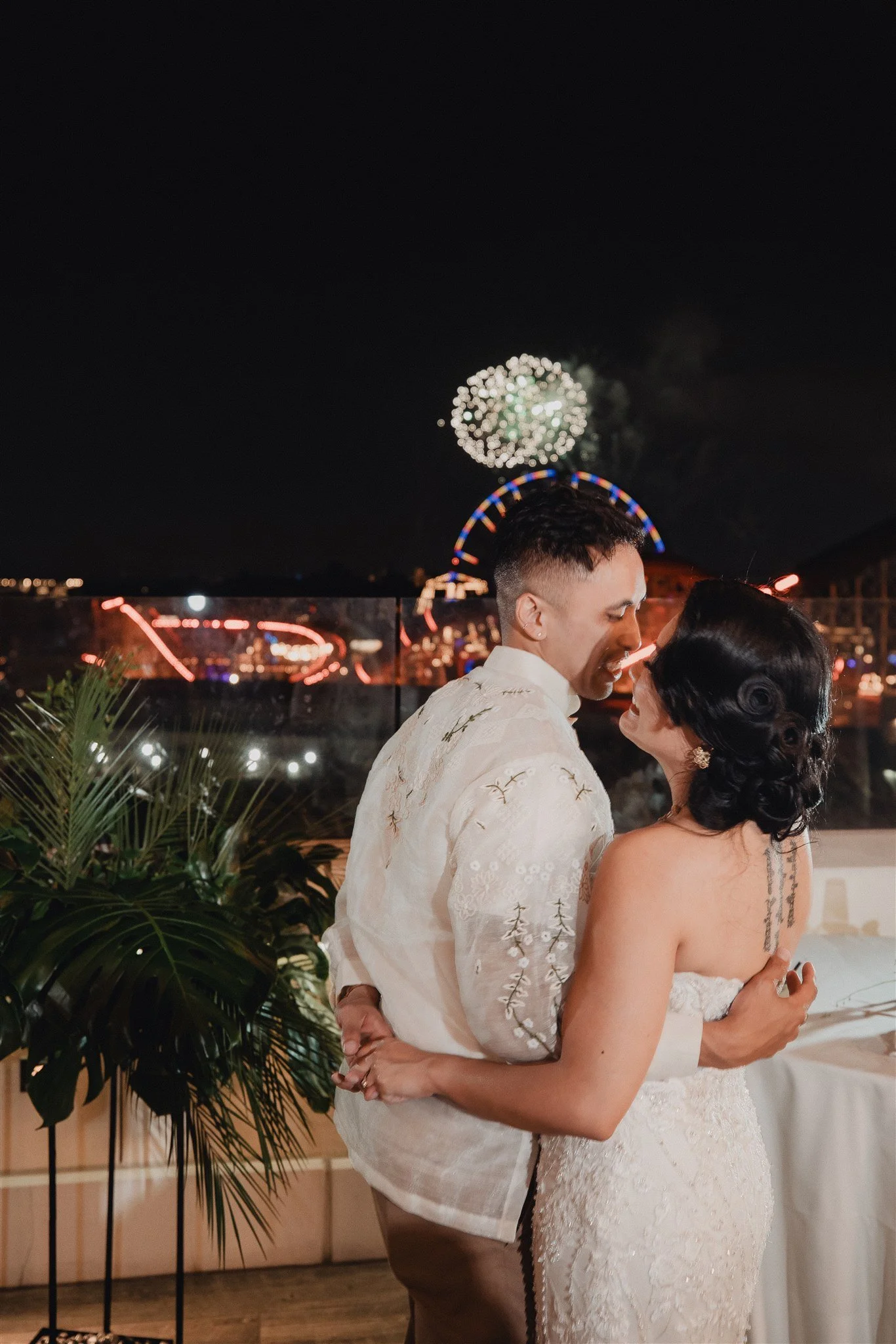 bride and groom at their wedding reception at california adventure disney park