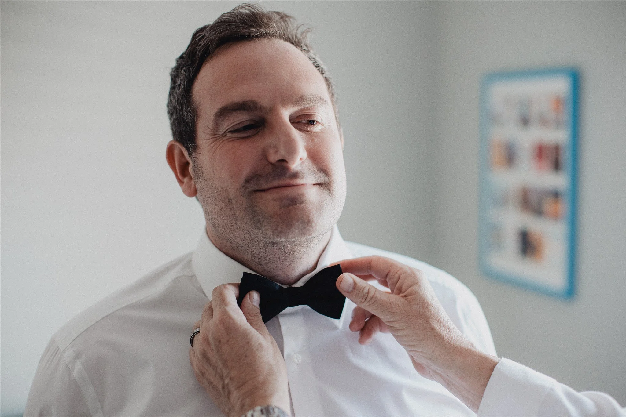 groom getting ready for his wedding day at castaway burbank