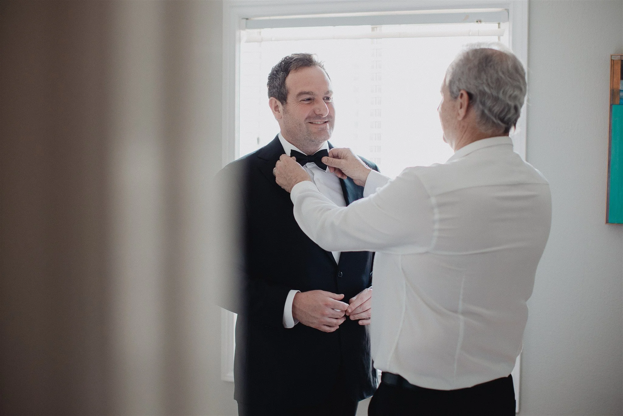 groom getting ready for his wedding day at castaway burbank