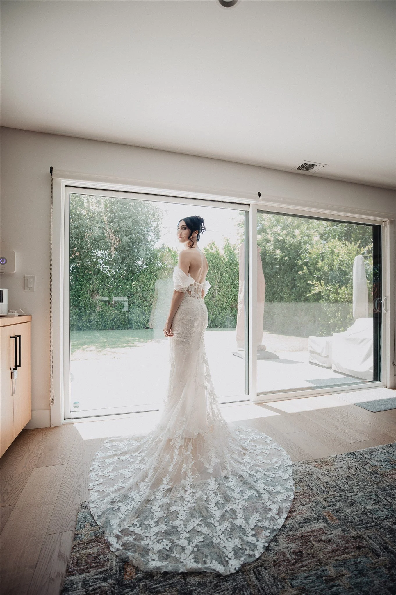 Bride in her gown at the doorway before a San Fernando Valley wedding ceremony