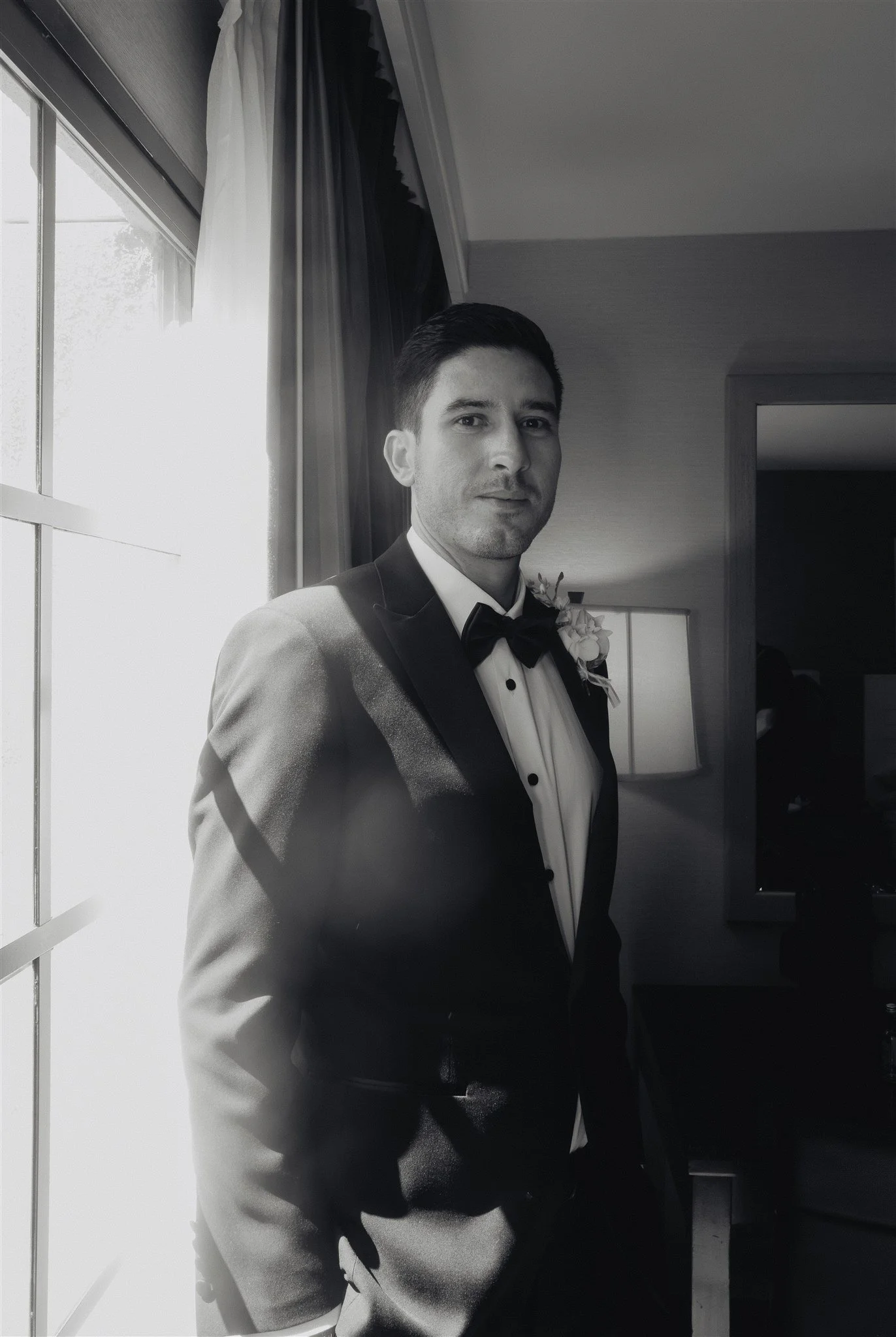 groom getting ready for his wedding day at DoubleTree in San Pedro