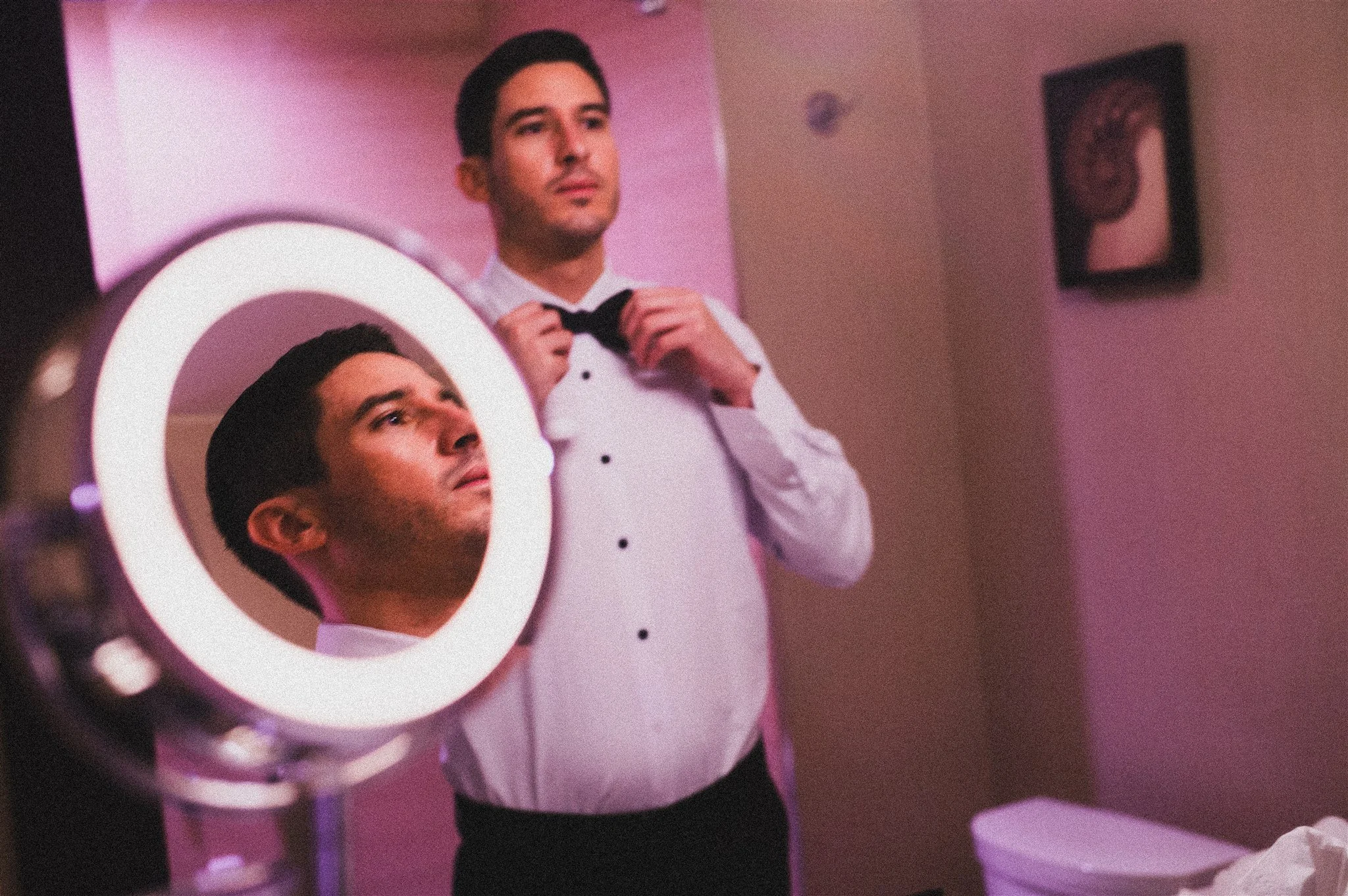 groom getting ready for his wedding day at DoubleTree in San Pedro
