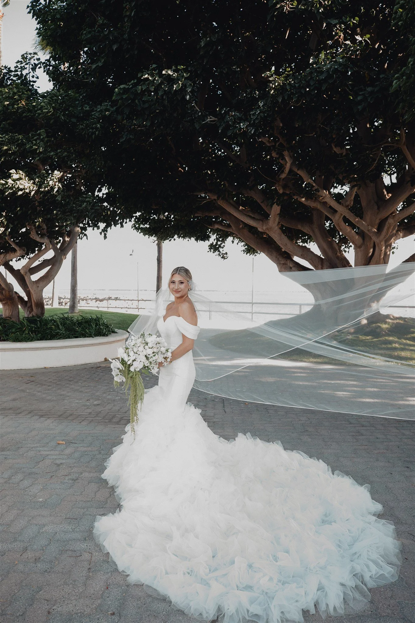 bride and groom portraits on their wedding day at DoubleTree San Pedro
