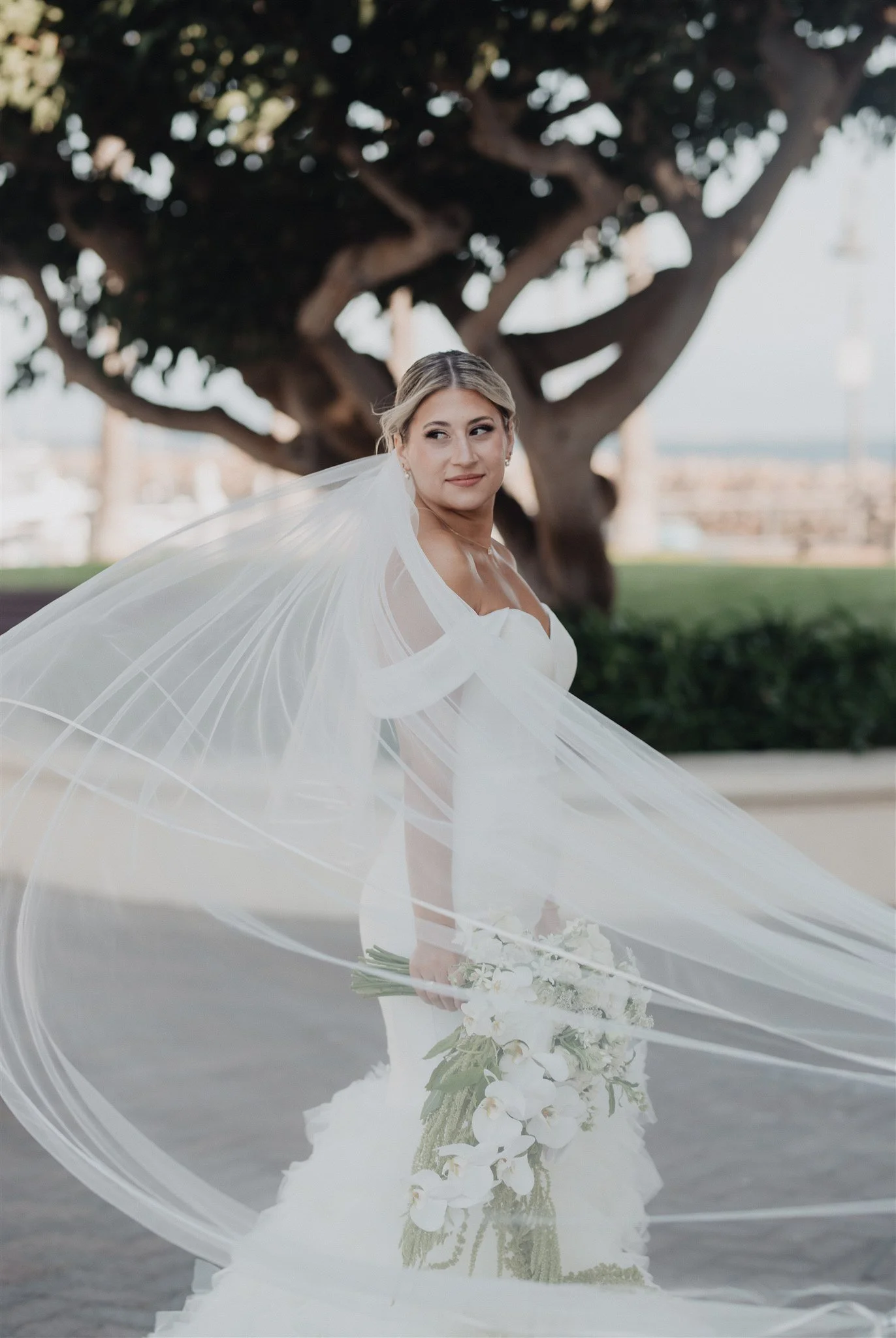 bride and groom portraits on their wedding day at DoubleTree San Pedro
