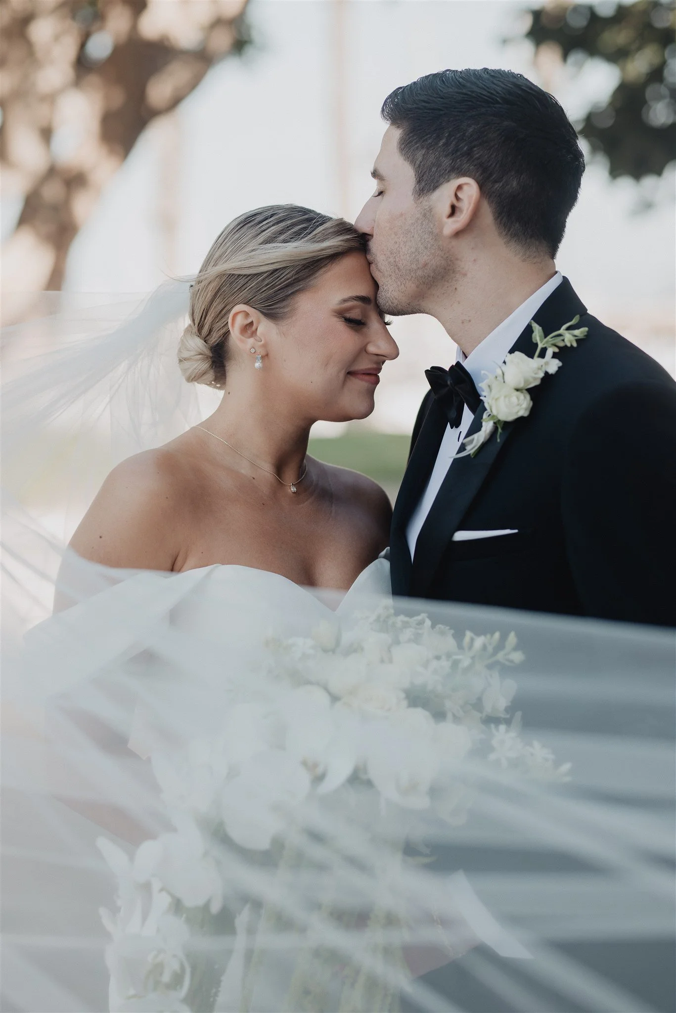 bride and groom portraits on their wedding day at DoubleTree San Pedro