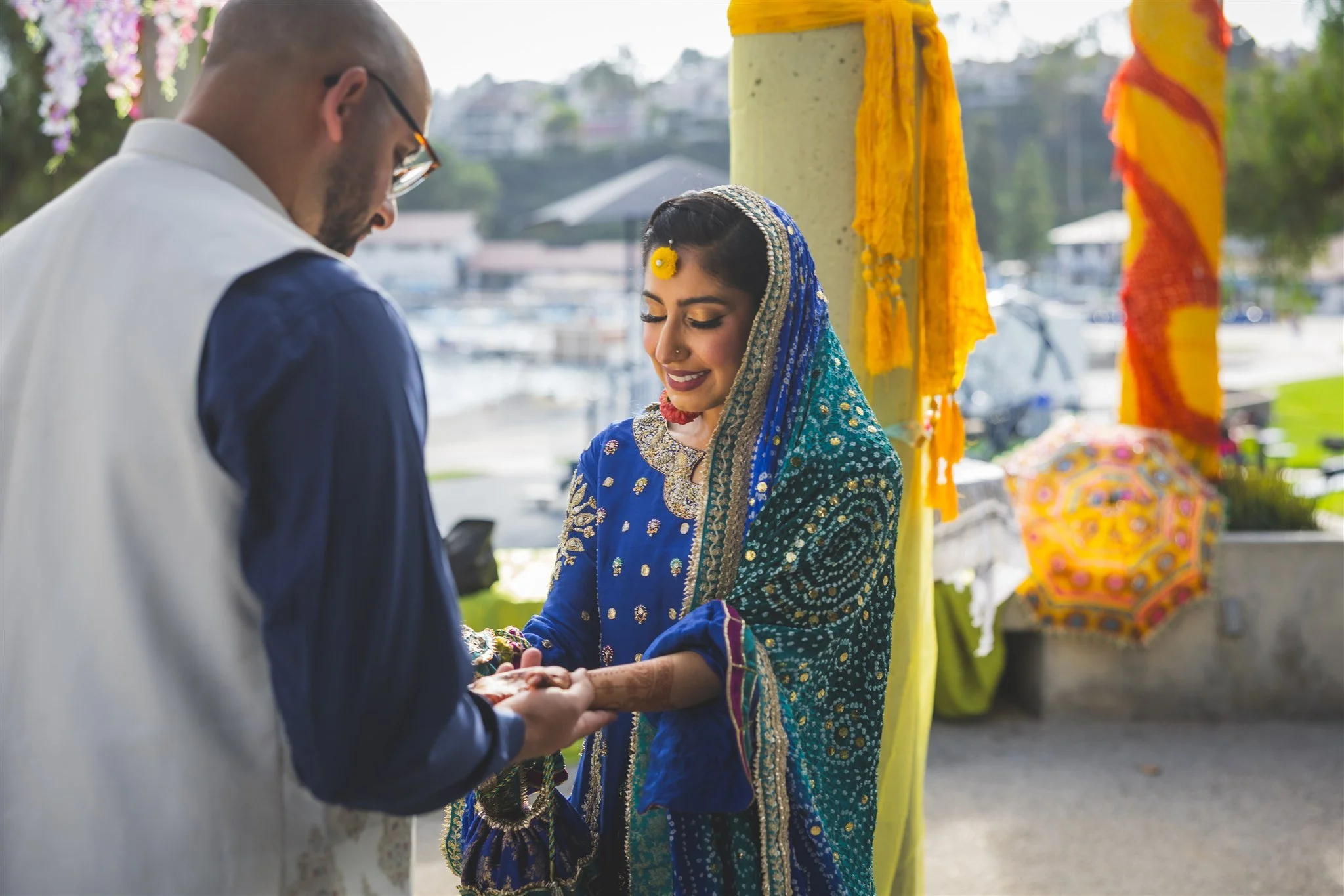 bride and groom first look at their pre-wedding event at lake mission viejo clubhouse