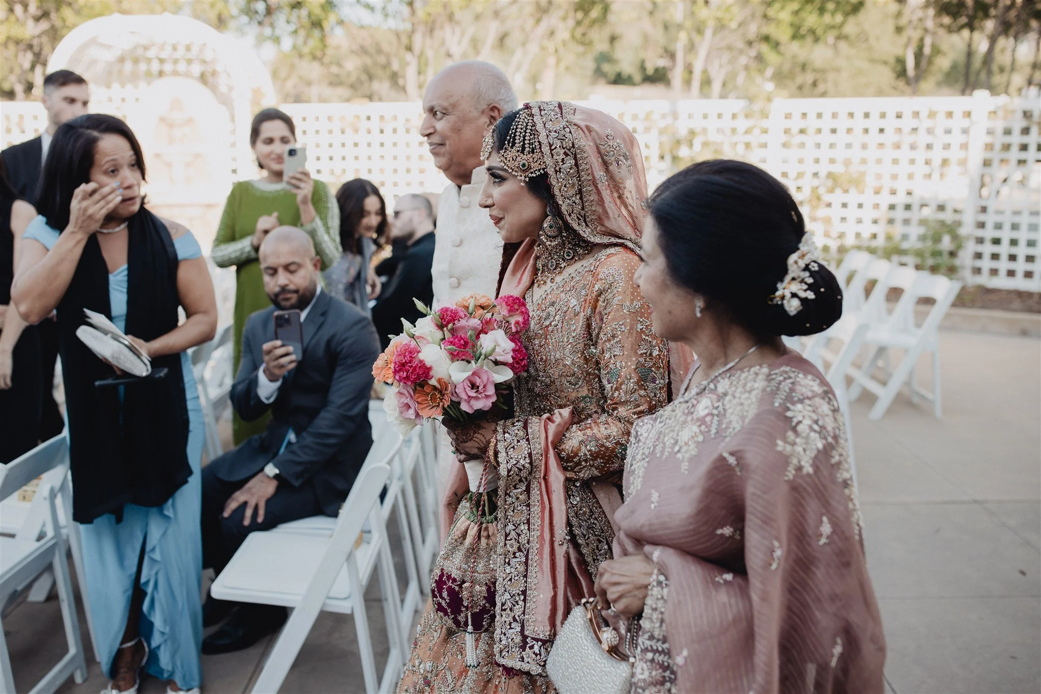 bride walking down the aisle on her wedding day at anaheim hills golf course