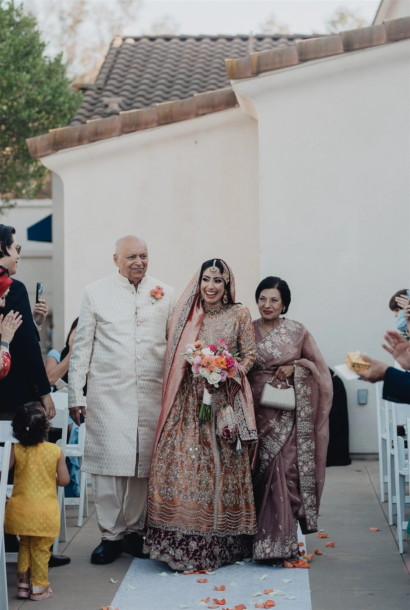 bride walking down the aisle on her wedding day at anaheim hills golf course