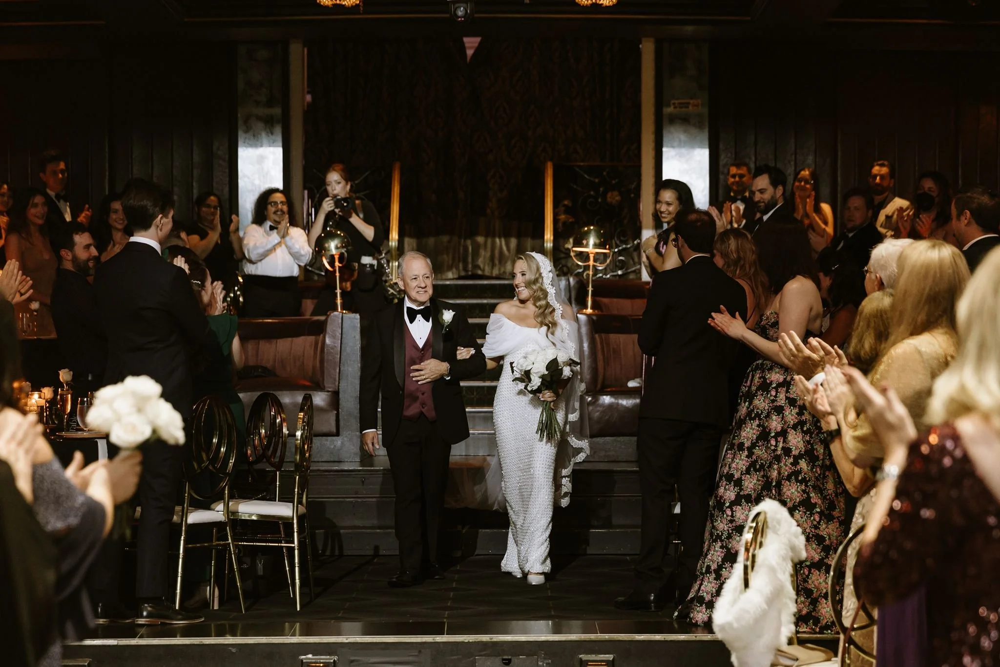 bride walking down the aisle to her wedding ceremony at avalon hollywood